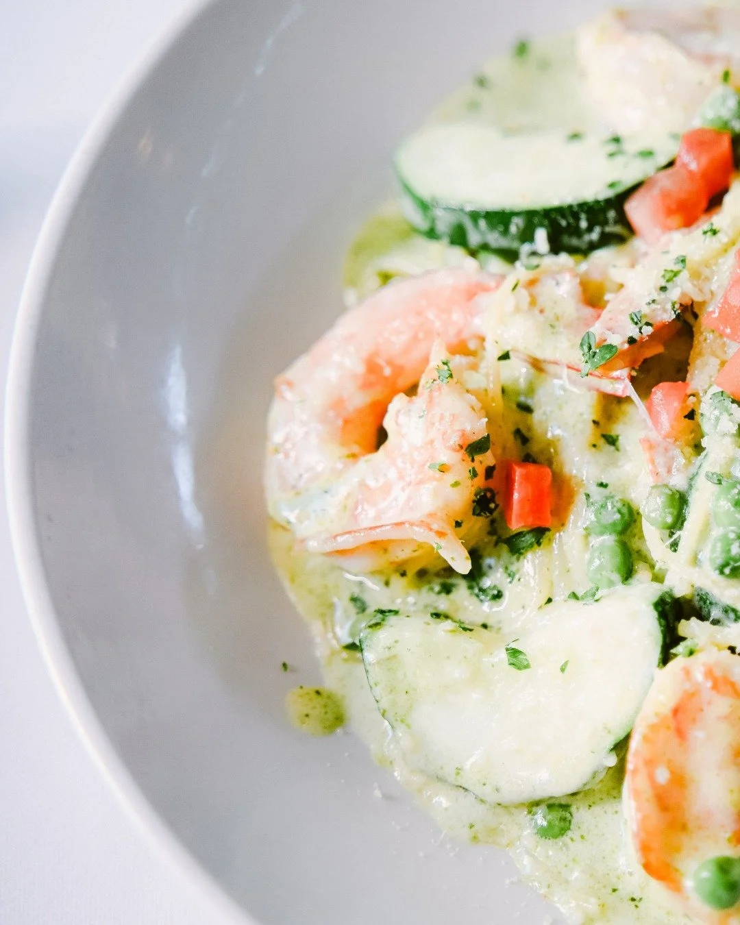 Light, flavorful, and full of color.
Spaghettini Genovese is a celebration of pesto, seafood, and the freshness of Italy on a plate.