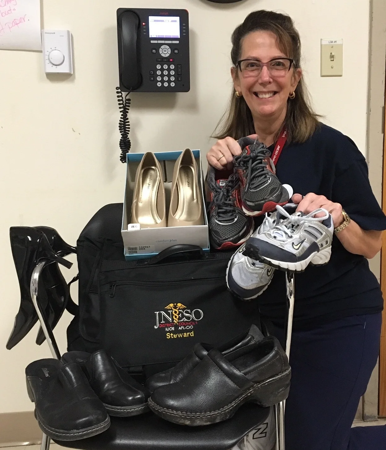 JNESO Chief Steward and Board Member Annmarie Ruggiero shows some of the 200 pairs of shoes collected for The Girls On The Run Pocono program