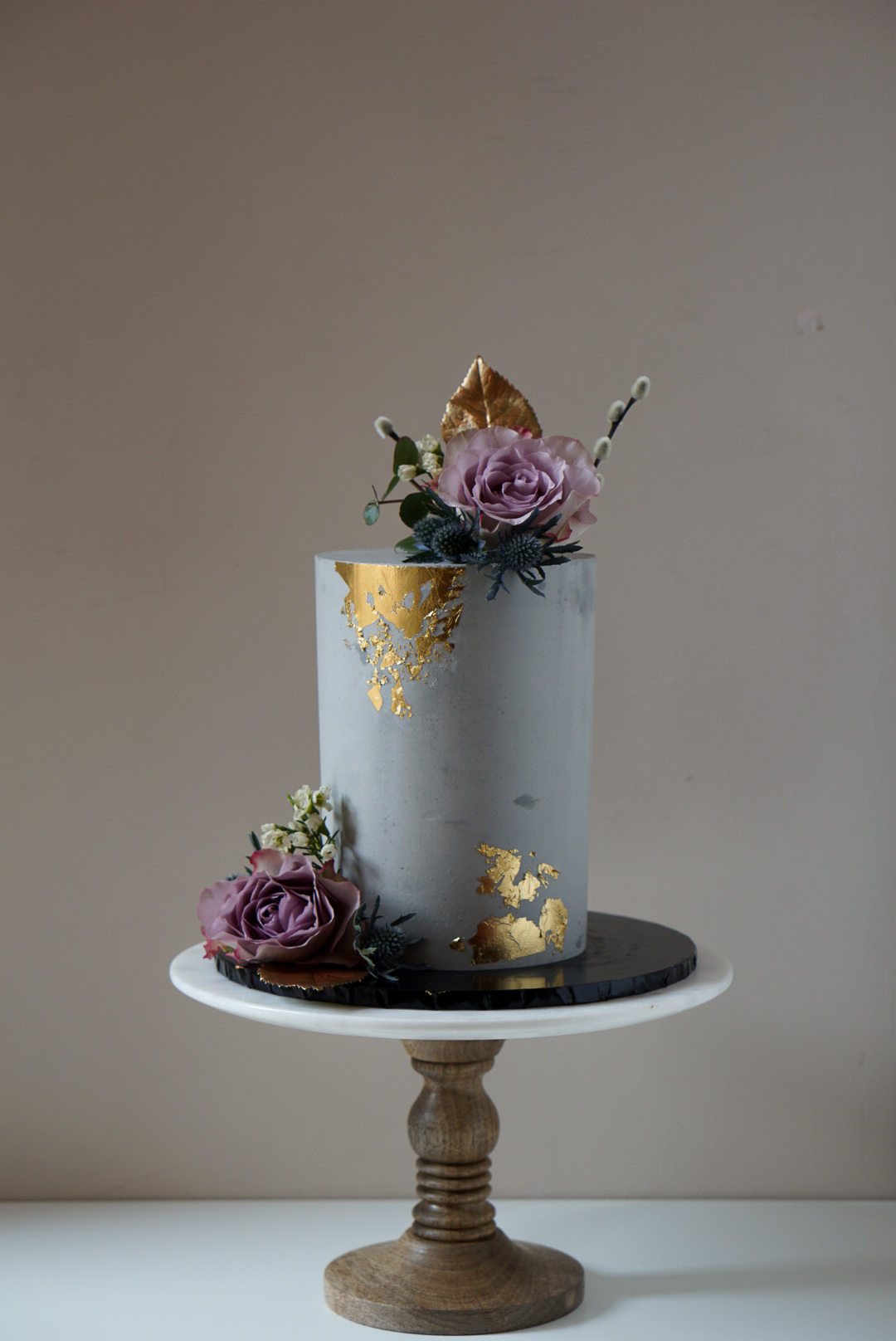 Concrete cake with gold leaf