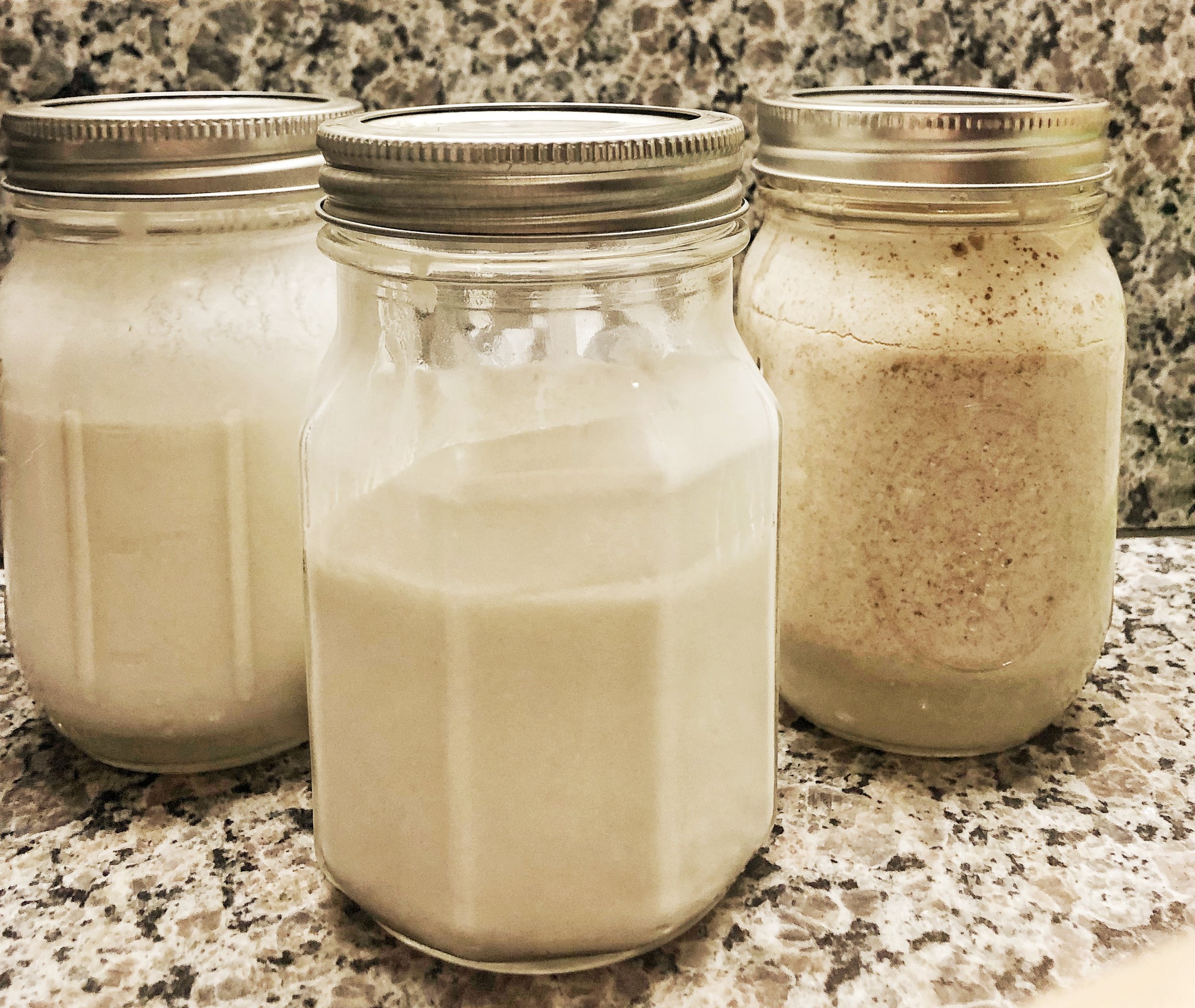 Coconut milk yogurt. Yogurt cultures stirred into coconut milk and left to ferment give it its thick and tangy flavor.