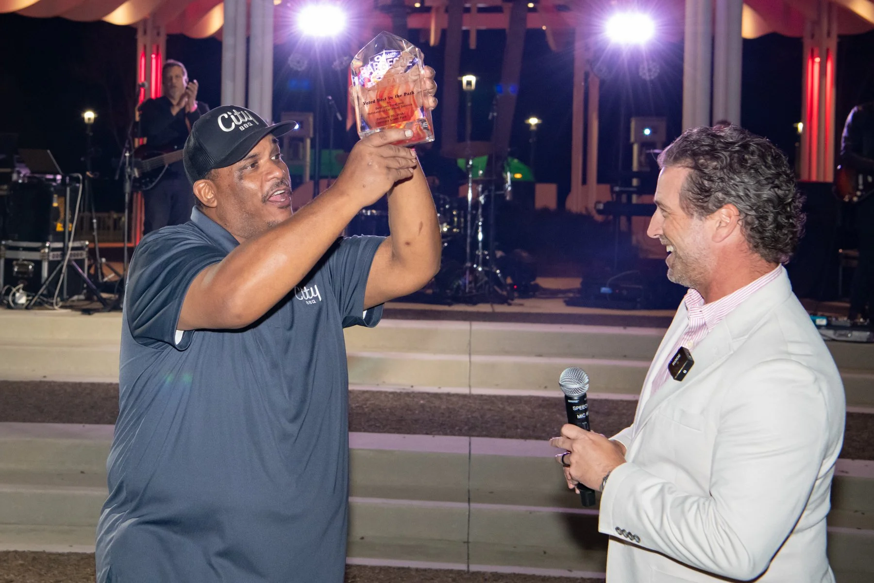 FSP - City Barbeque Chef holding up award.jpg