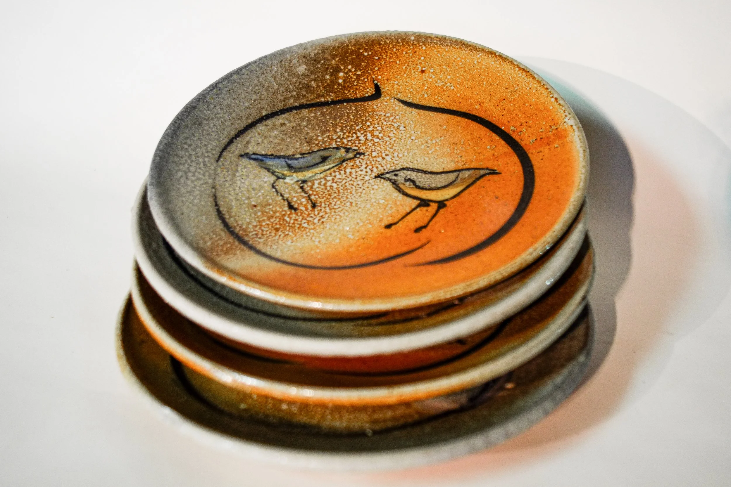 Greene-Ziner Soda fired Bird Plates.jpeg