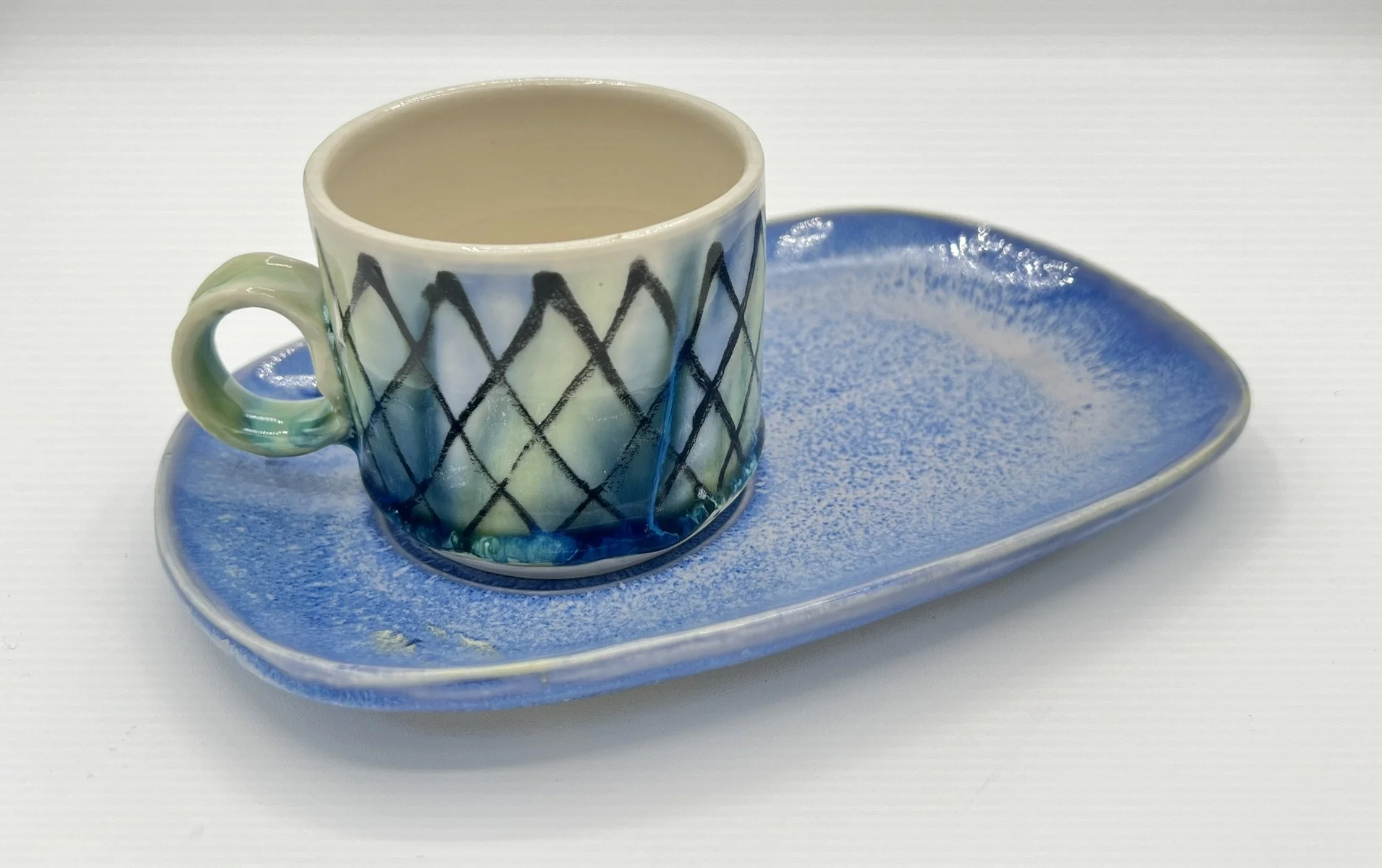 espresso and saucer.jpeg