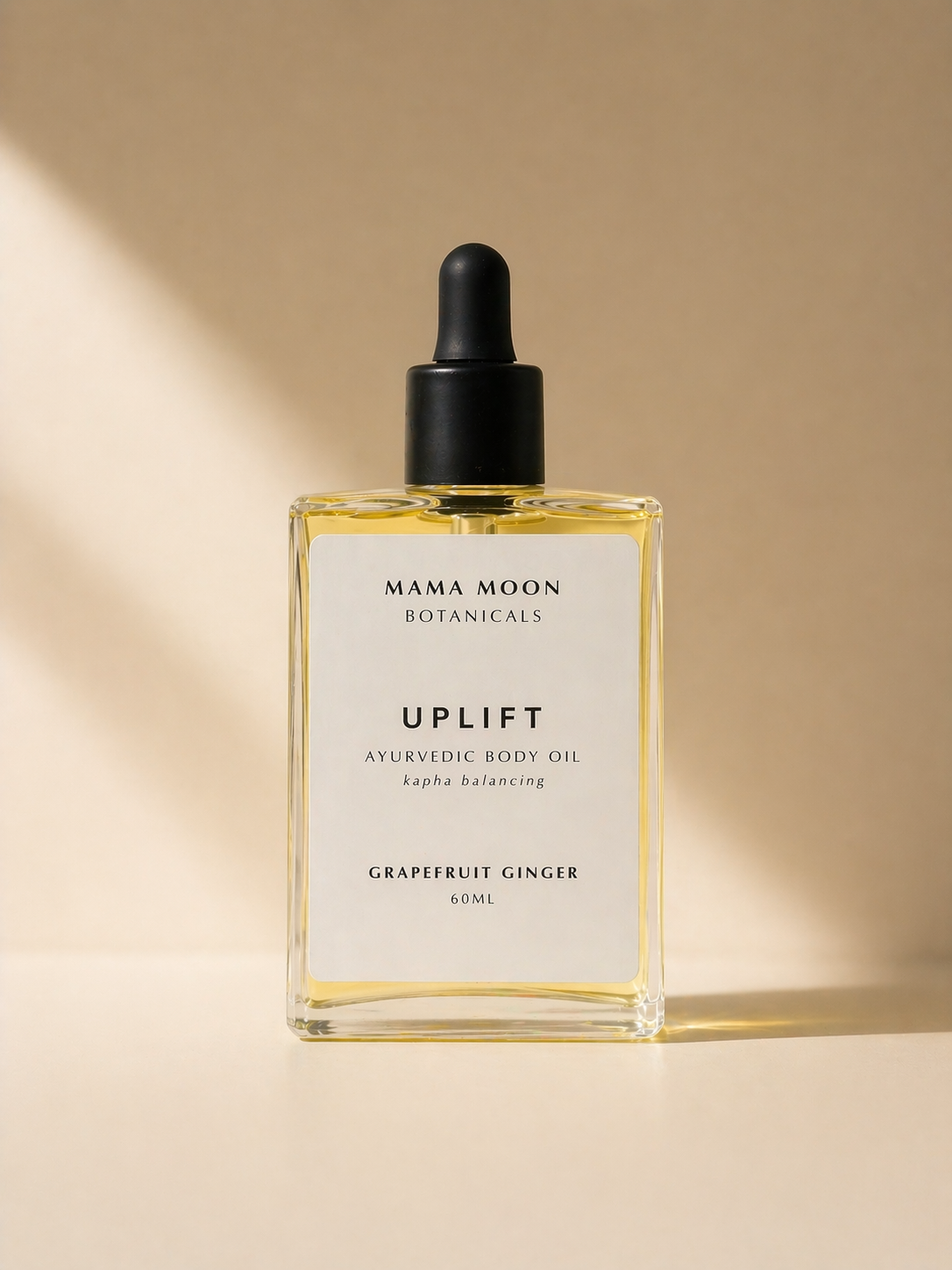 mama-moon-botanicals-uplift-body-oil-ylang-grapefruit-ginger.jpg