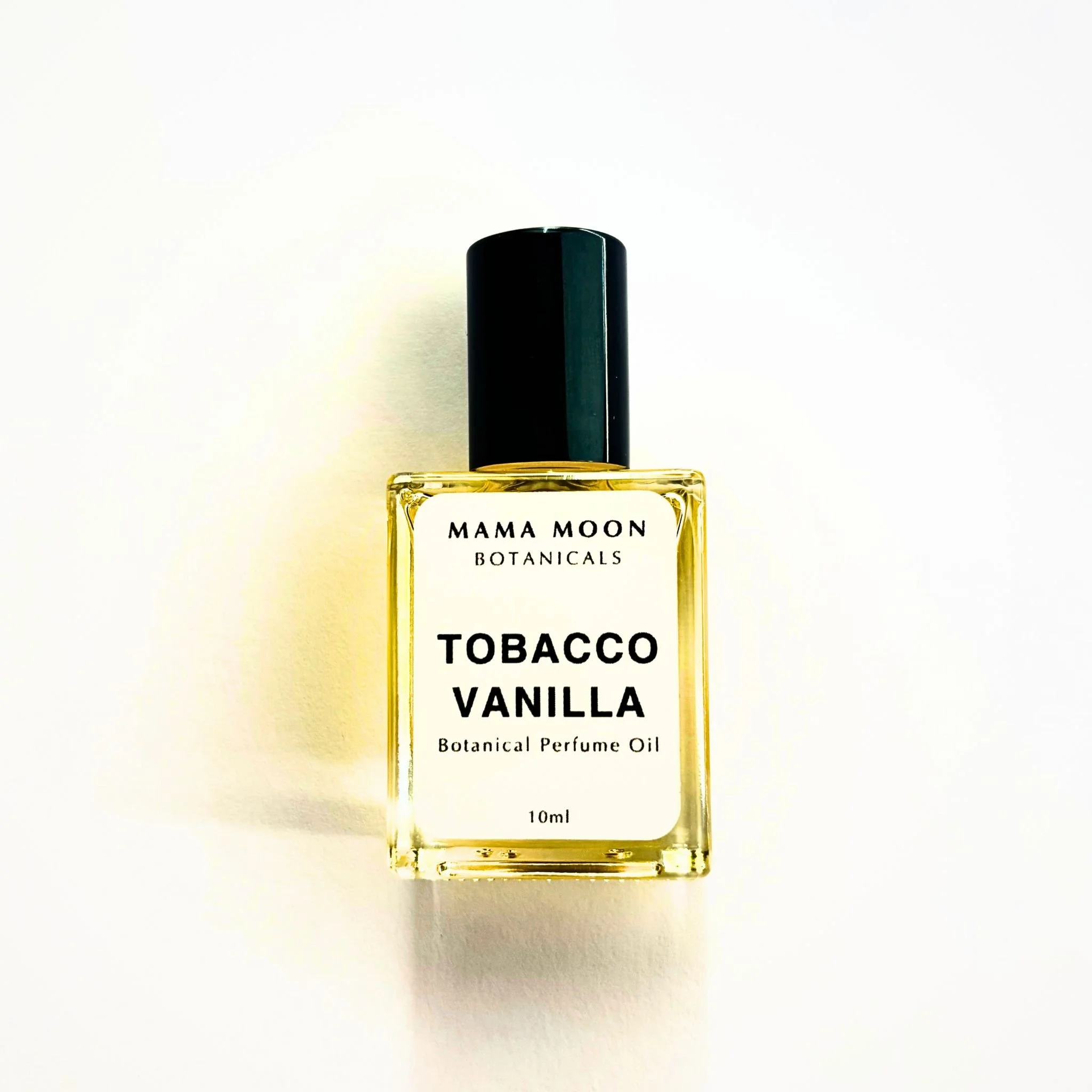 Tobacco Vanilla botanical perfume oil by Mama Moon Botanicals in 10ml glass bottle