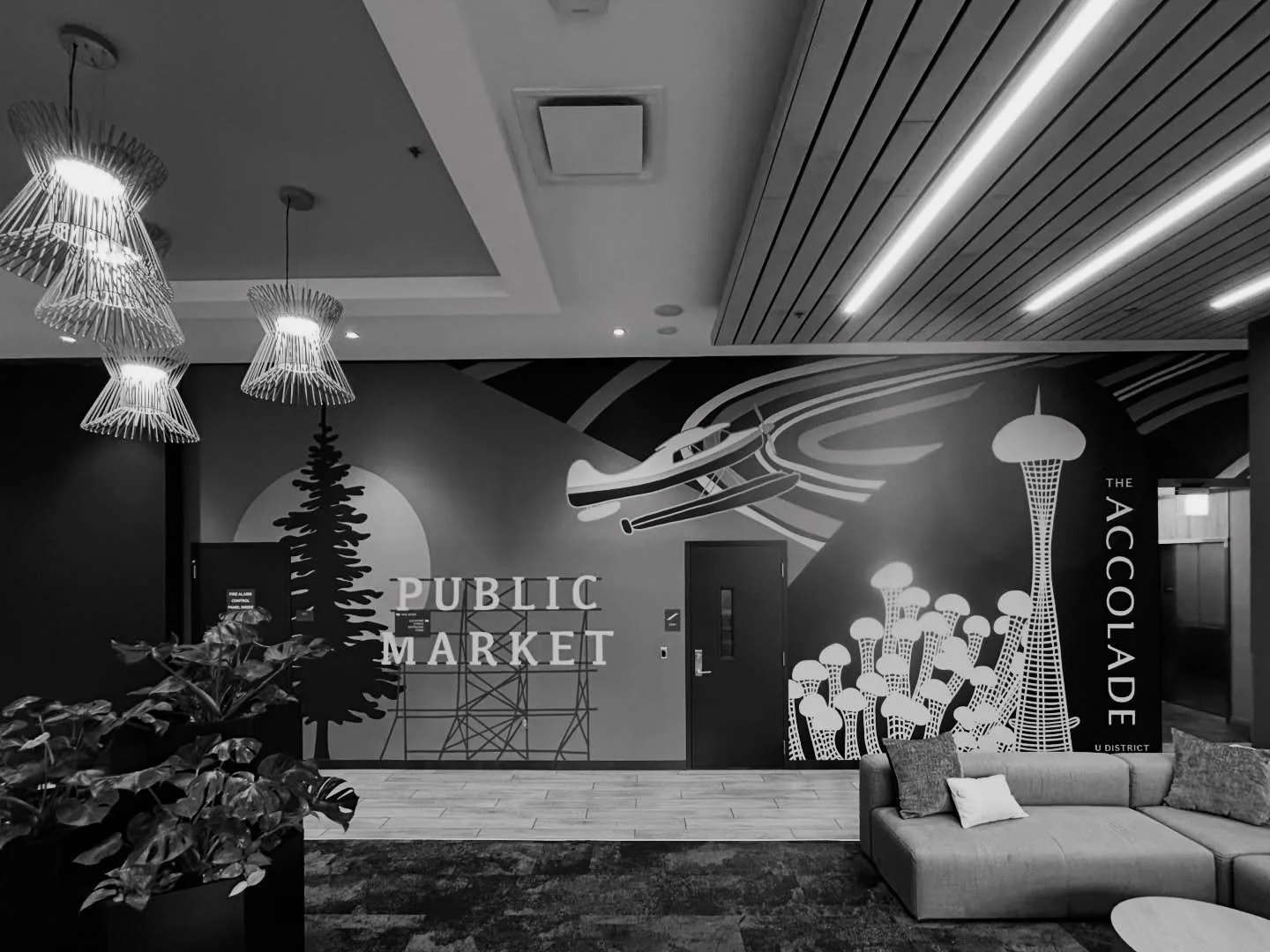 ☝🏽st half of this very large lobby mural designed by @bonesandgold - installed with @purebonaventure + @tykreft in the #universitydistrict late last year! 
#overallcreative 
✨
thx ty for the pics 🤳🏼!