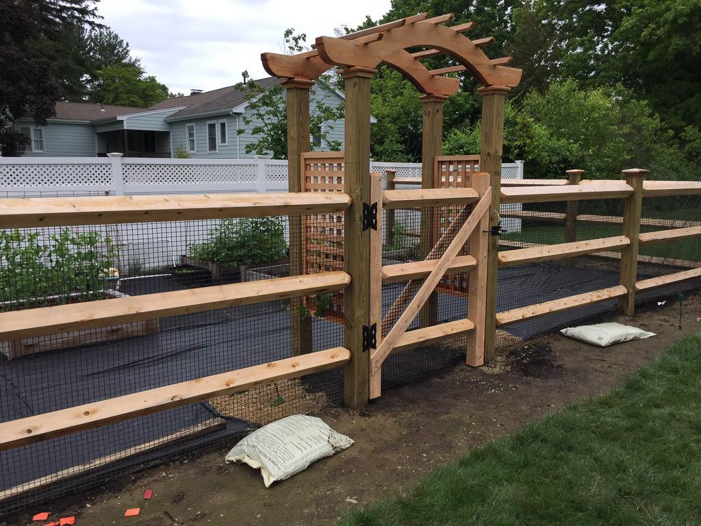 arbor with post and rail in Bedford