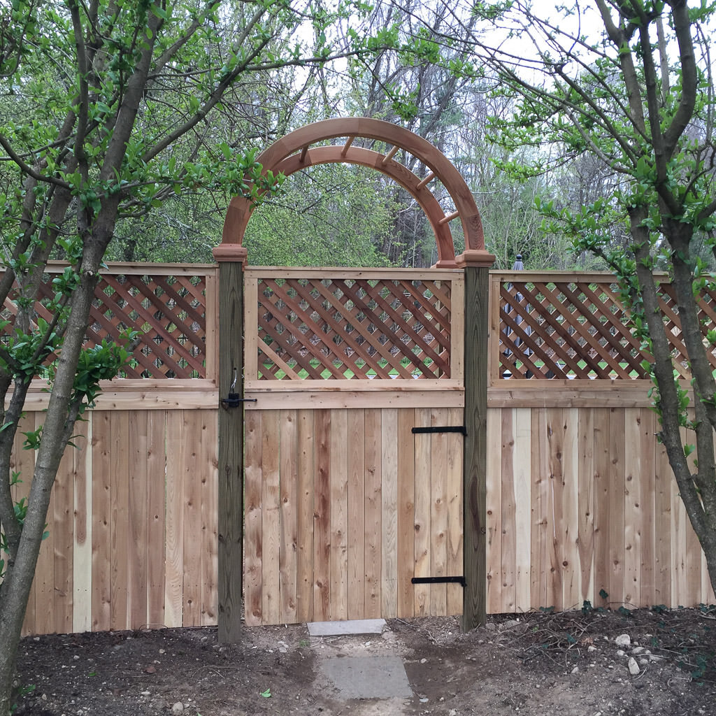 cedar arbor with lattice fence in Wellesley