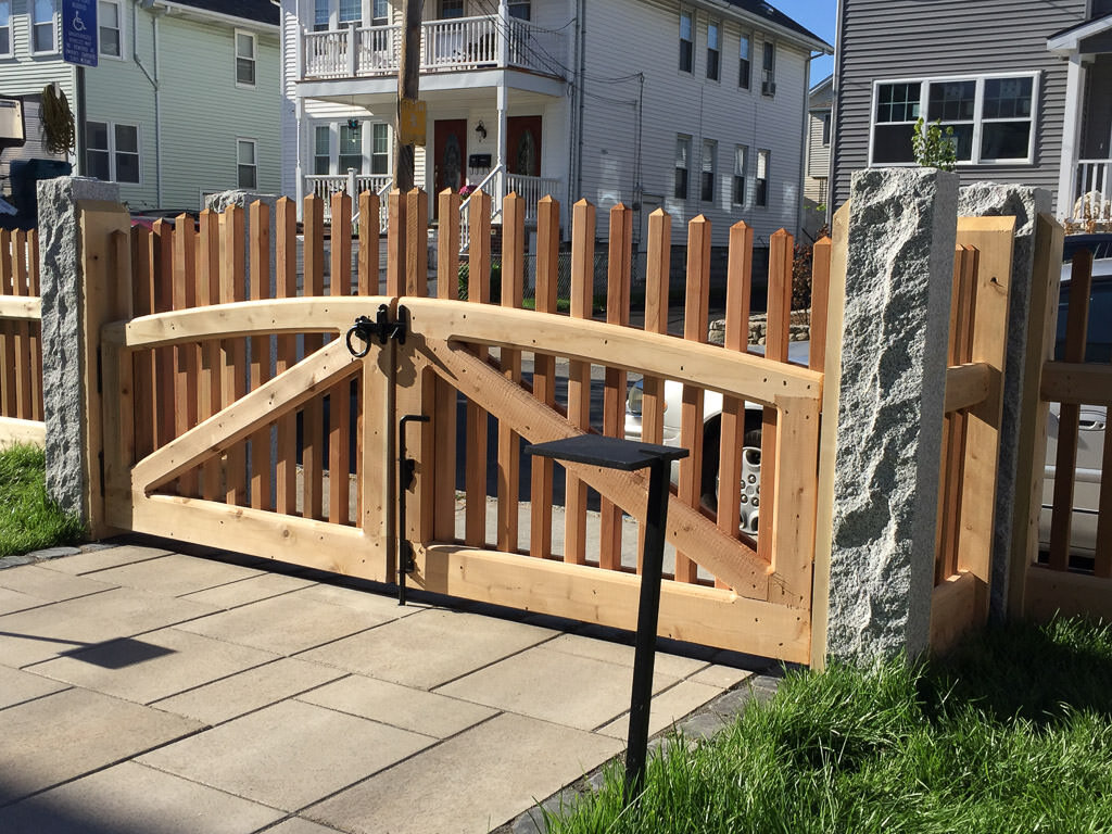 custom gate with granite posts