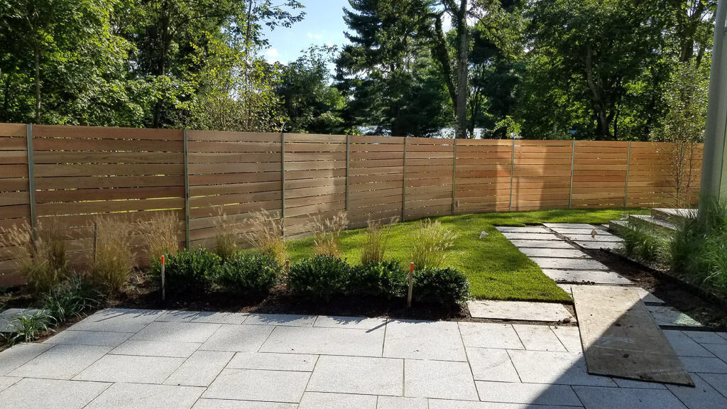 Horizontal board, steel post in Weston