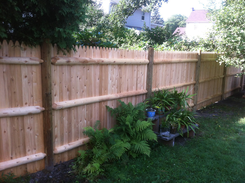 Cedar stockade with rustic rails in Belmont