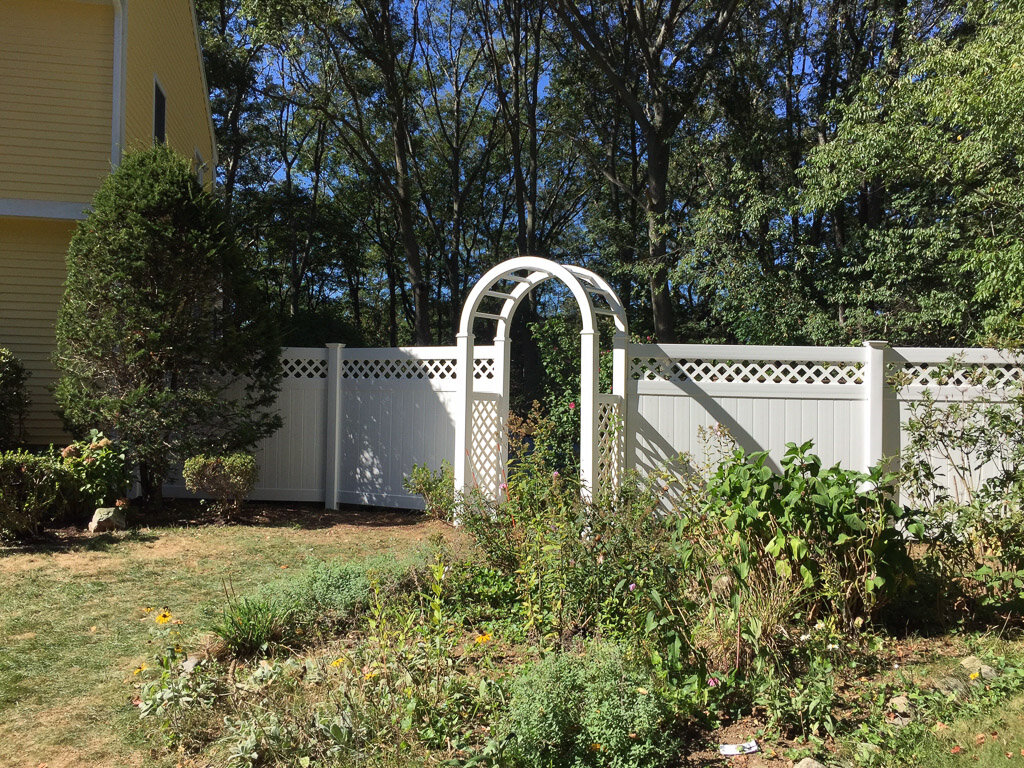 board and lattice with arbor in Belmont