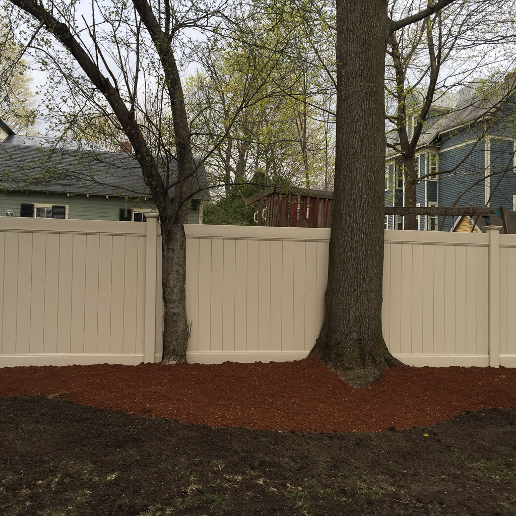 TAN privacy around tree in Watertown