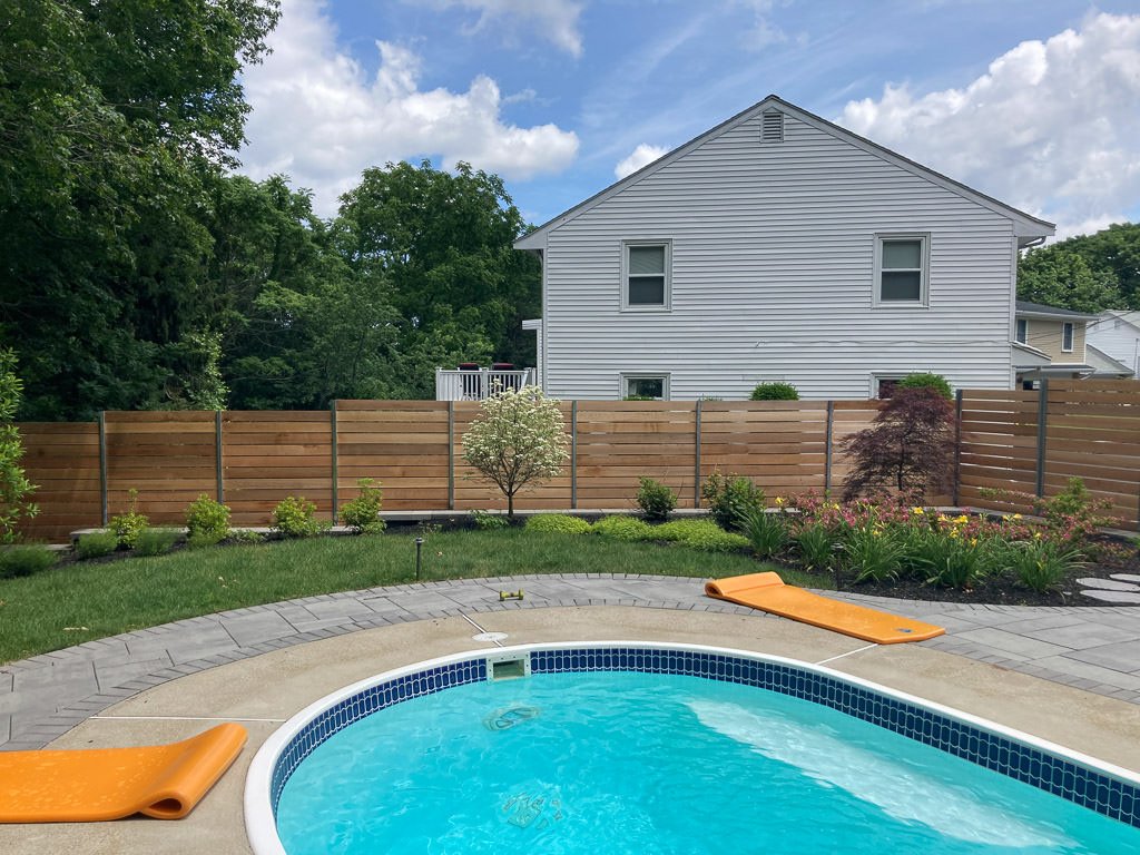 Horizontal board pool fence in Boston