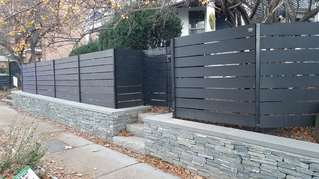 Horizontal board, stained black in Brookline