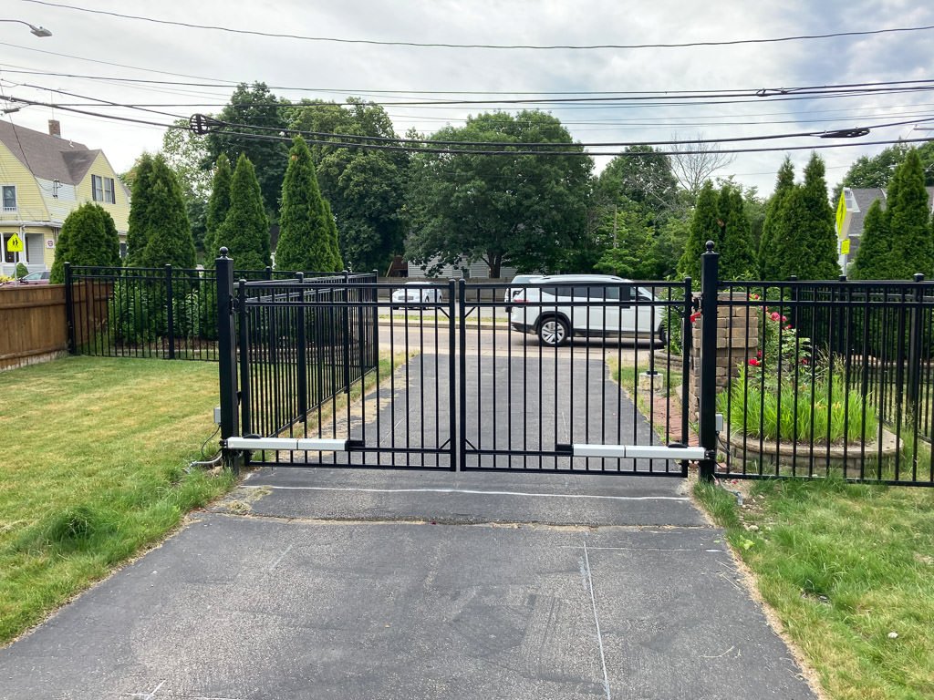 Motorized steel gate with phone access in Dedham
