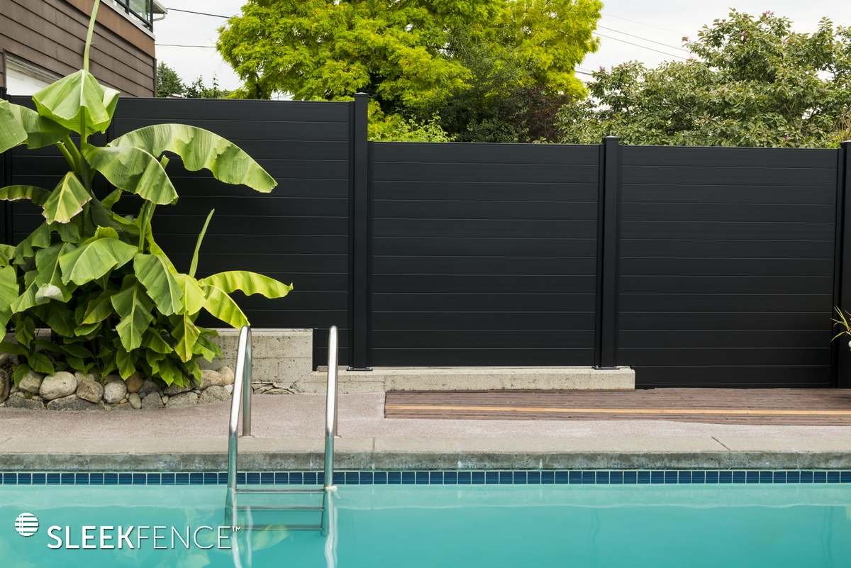 Beautiful black fence surrounding pool.jpg