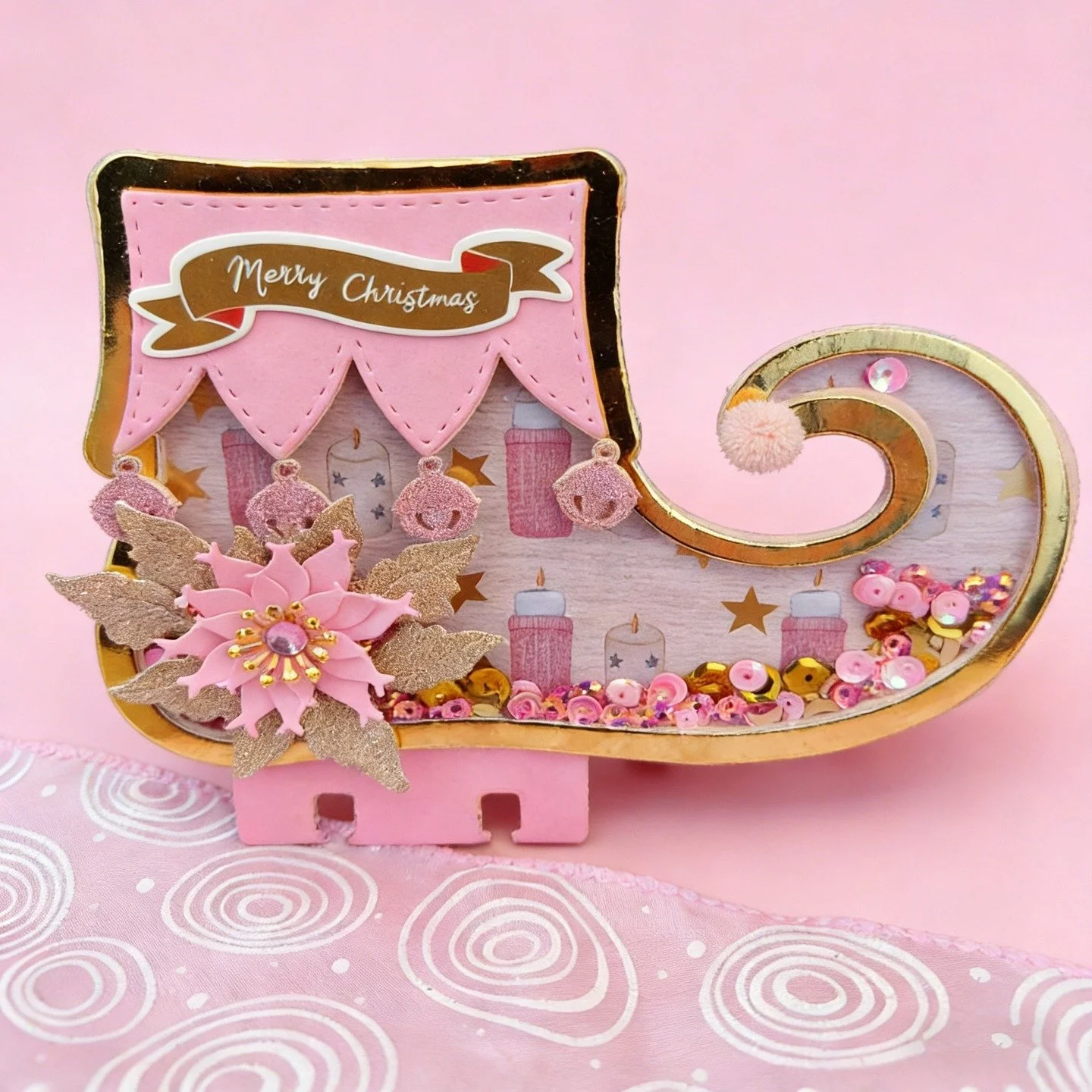 Craft queen @hermanas.scraperas &rsquo; tiny boot decor&mdash;pink, sparkly, and oh-so-festive cuteness overload!Who wants this little cutie on their shelf?#HandmadeBoot #PinkSparkles #craftqueen #DIYHoliday #PaperCrafts #ChristmasCuties #CozyHomeVib