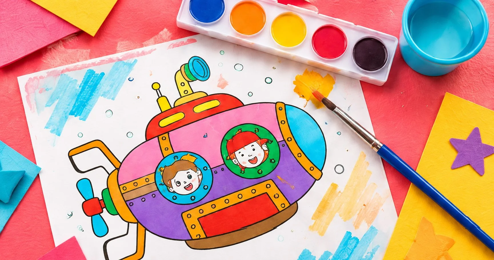 Colourful children’s submarine painting with watercolours and craft materials.