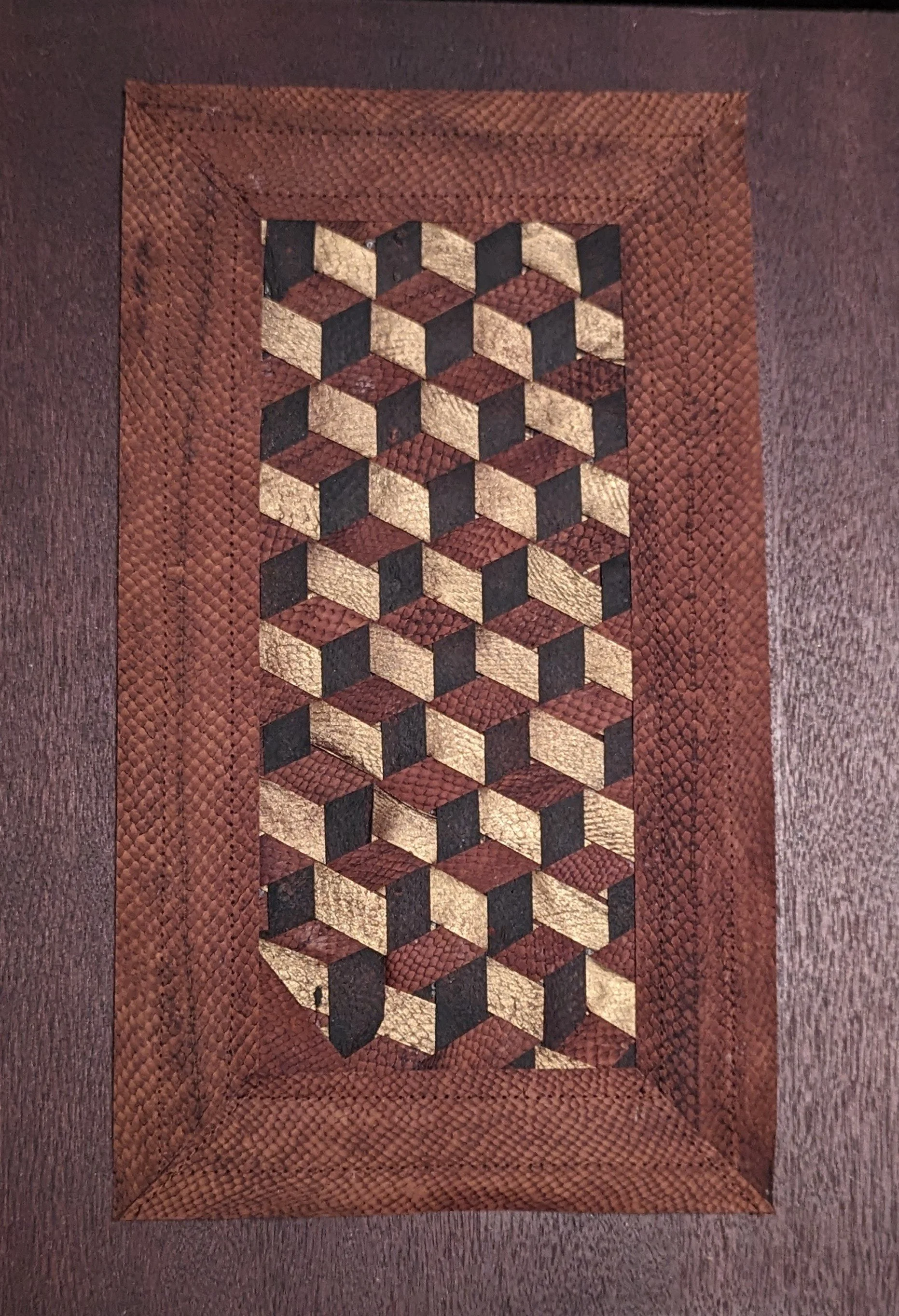 A madman's weave with 3 colors of fish leather strips