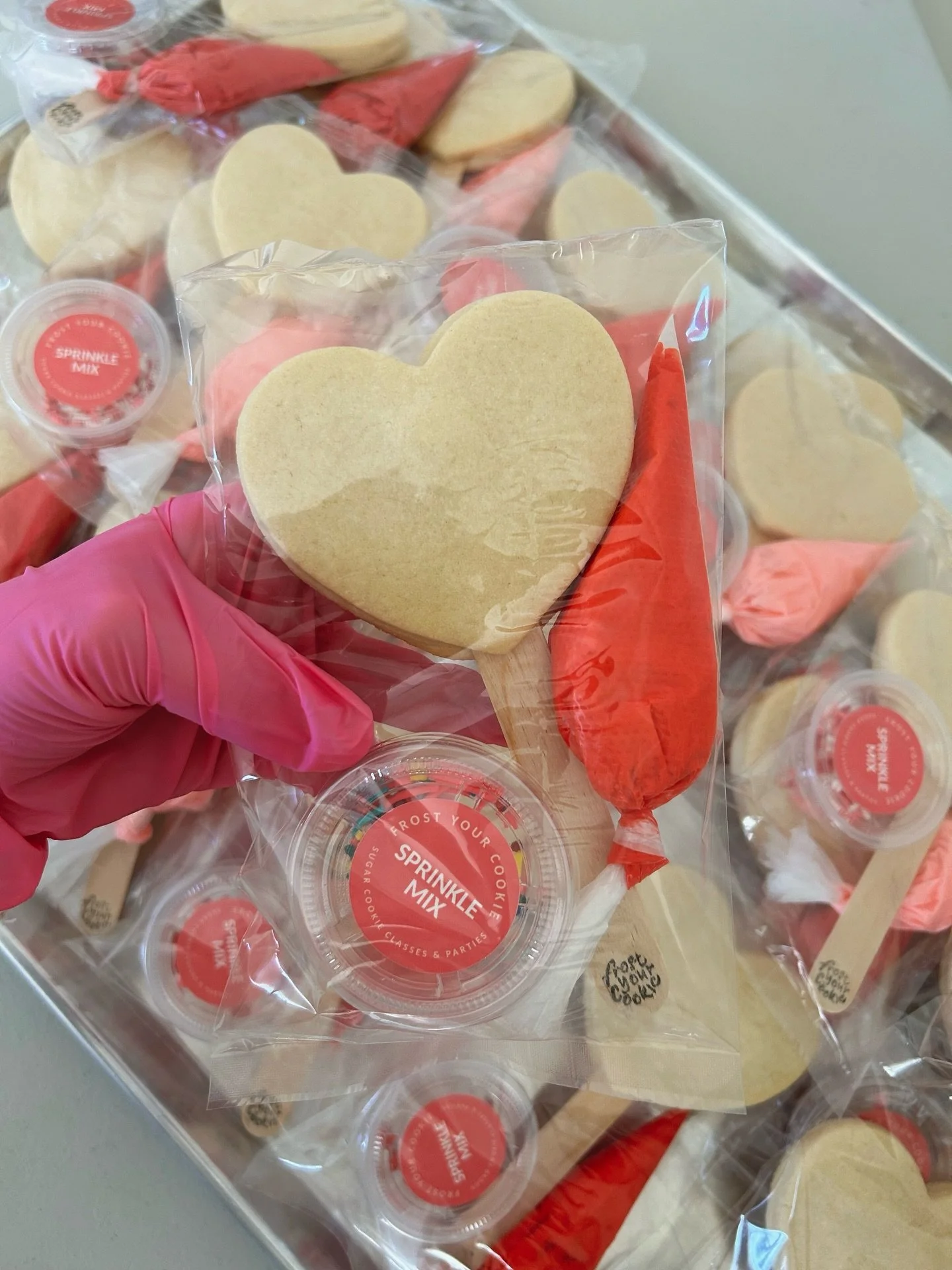 Dropping these sugar bombs into your feed 💕 PSA: Snag yours by February 7th for Valentine&rsquo;s Delivery! 🍪💝

Featured: Heart Party Favor Kit 24 Pack
 
#valentinesday #valentinesgifts #valentinecookies #cookiekit #diyvalentinesgift #diycookiekit