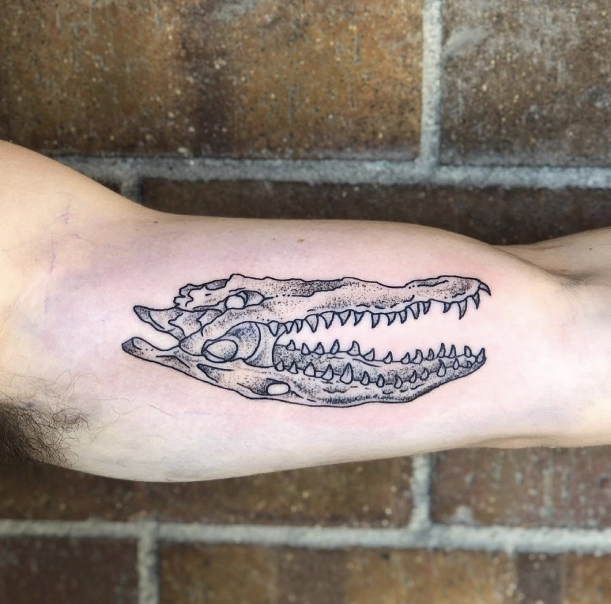 Neotraditional crocodile head tattoo on the right hand