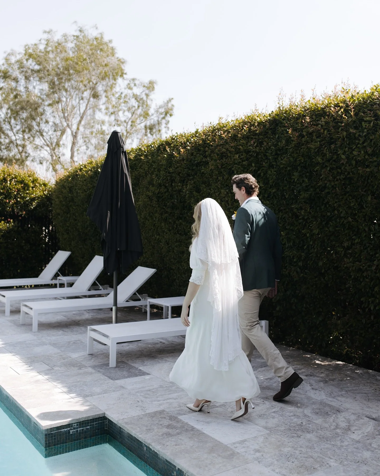 Quiet strolls by the pool after an intimate first look 🤍

#bridetobe #weddinginspo #tietheknot #weddingphotography #countrywedding #countryweddingphotographer #luxurywedding #destinationwedding  #realwedding #toowoombawedding #brisbanewedding #sceni