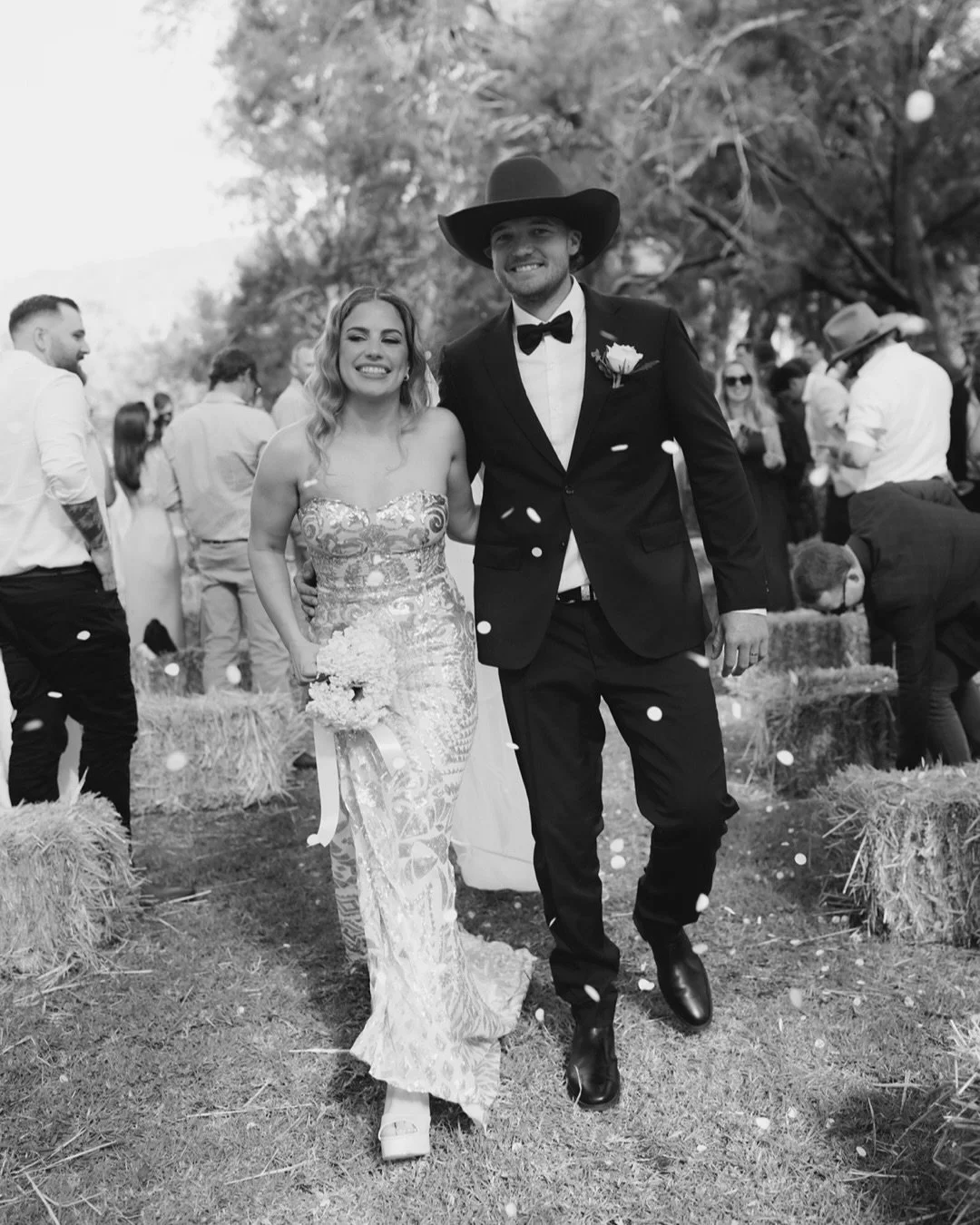 Eight years led them here, back to Sam&rsquo;s family property to tie the knot. Their vows carried on the soft trickle of the stream that flowed right beside the ceremony, little flower girls fluttering petals in the breeze and gosh it was fun. Brigh