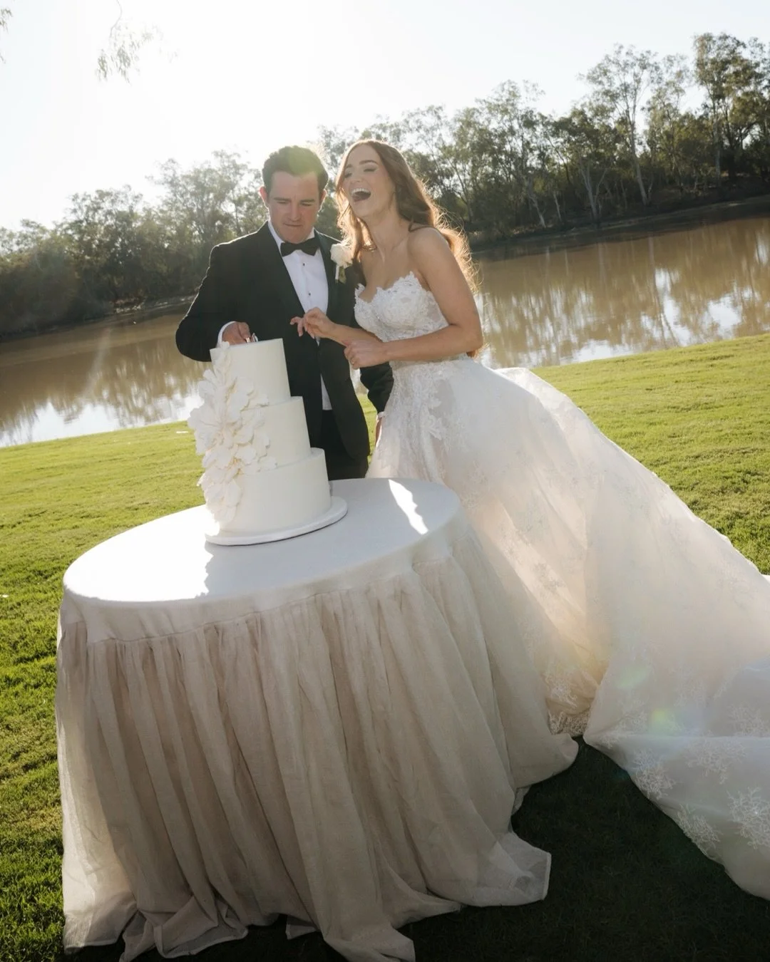 One for the ages. A timeless celebration that oozed romance, thoughtful detail, heartfelt moments and good old-fashioned country fun on the banks of the Balonne.  Ash and Ferg tied the knot at Ash&rsquo;s family home, a place layered with so much sen