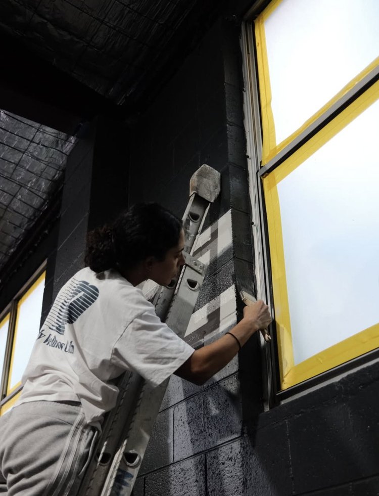 Painting the gym walls