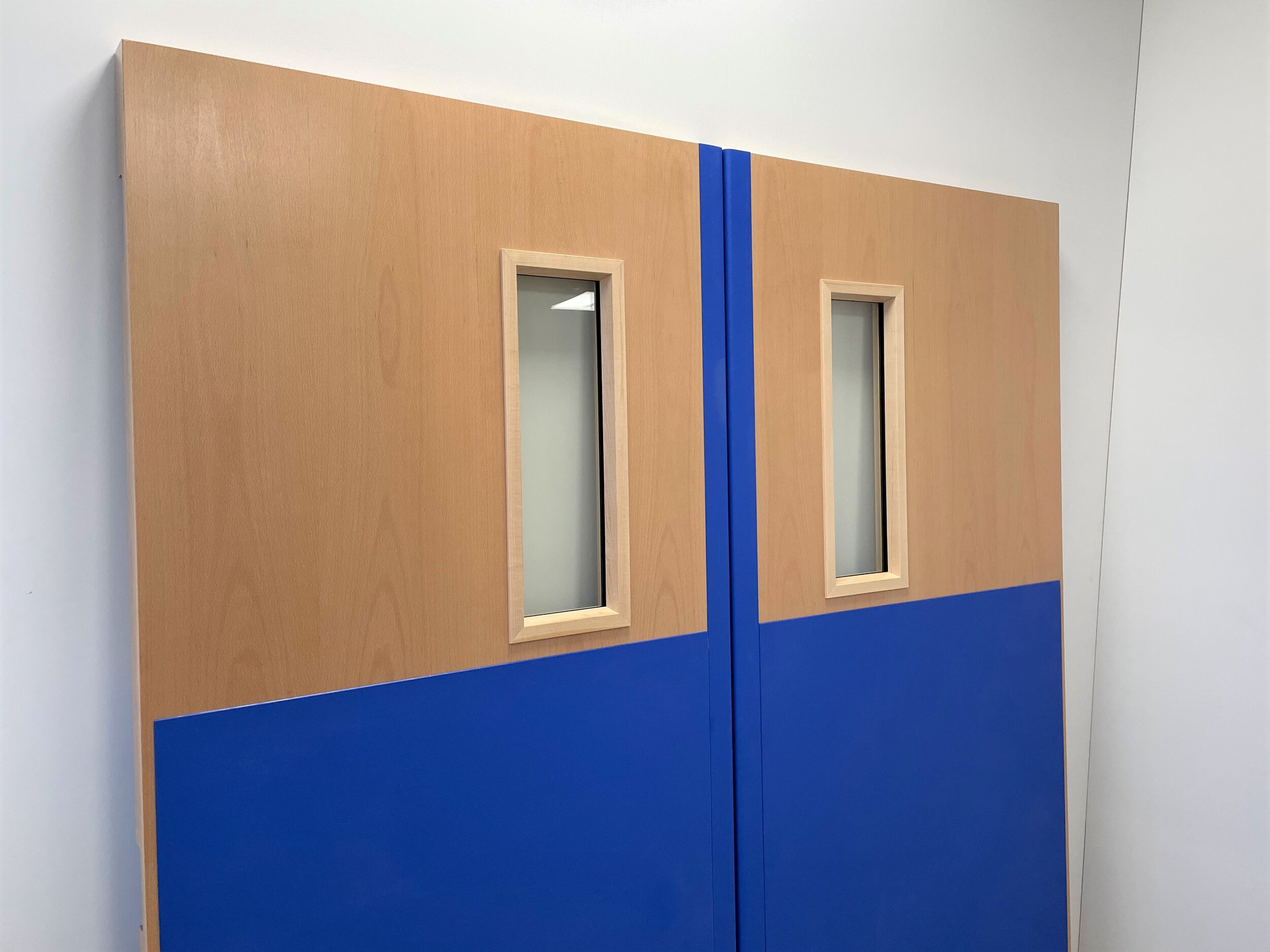 Pair of FD60 doors equipped with Yeoman protection panels and edge protection for the Birmingham Children's Hospital 