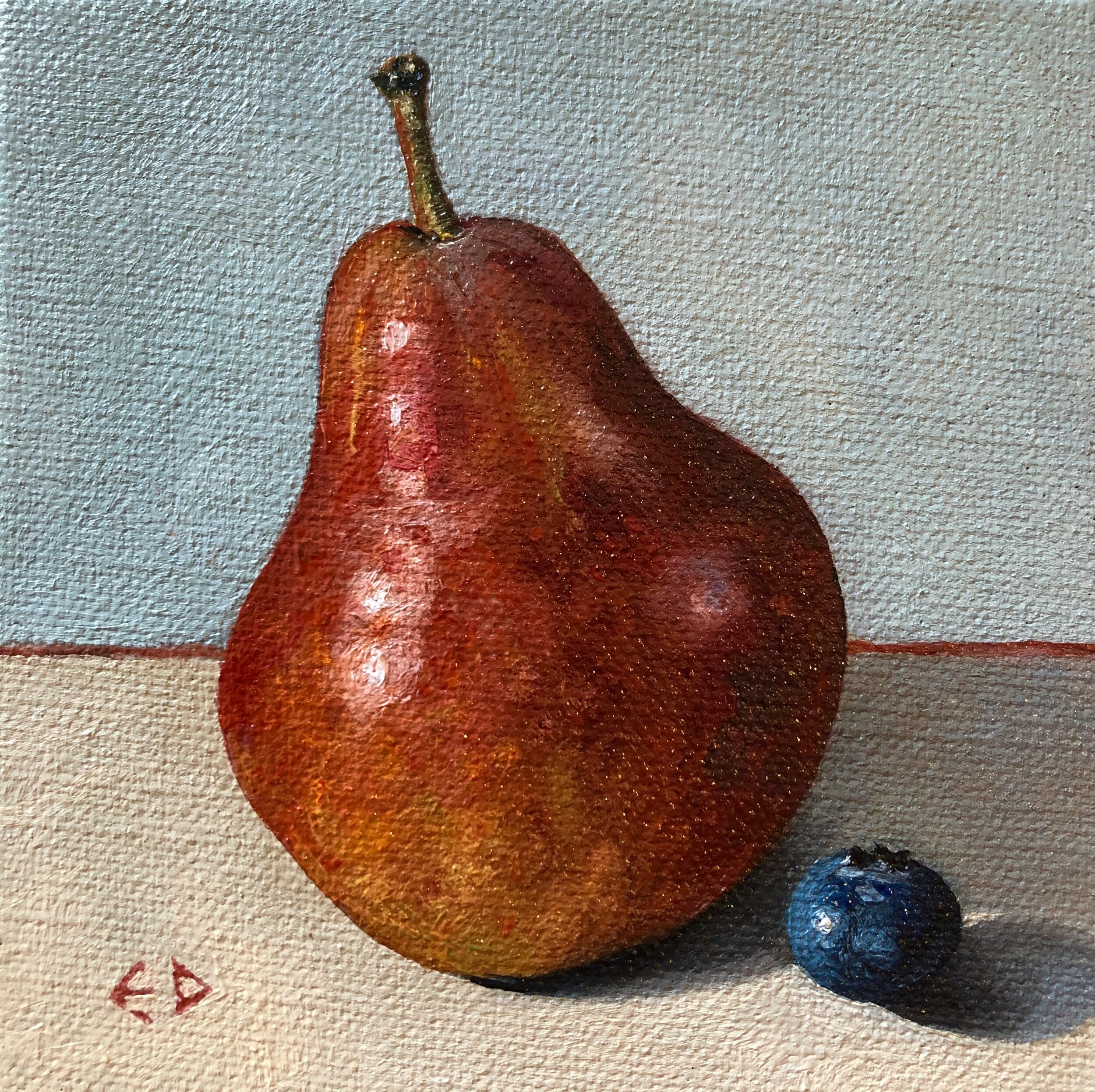 Small red pear with blueberry