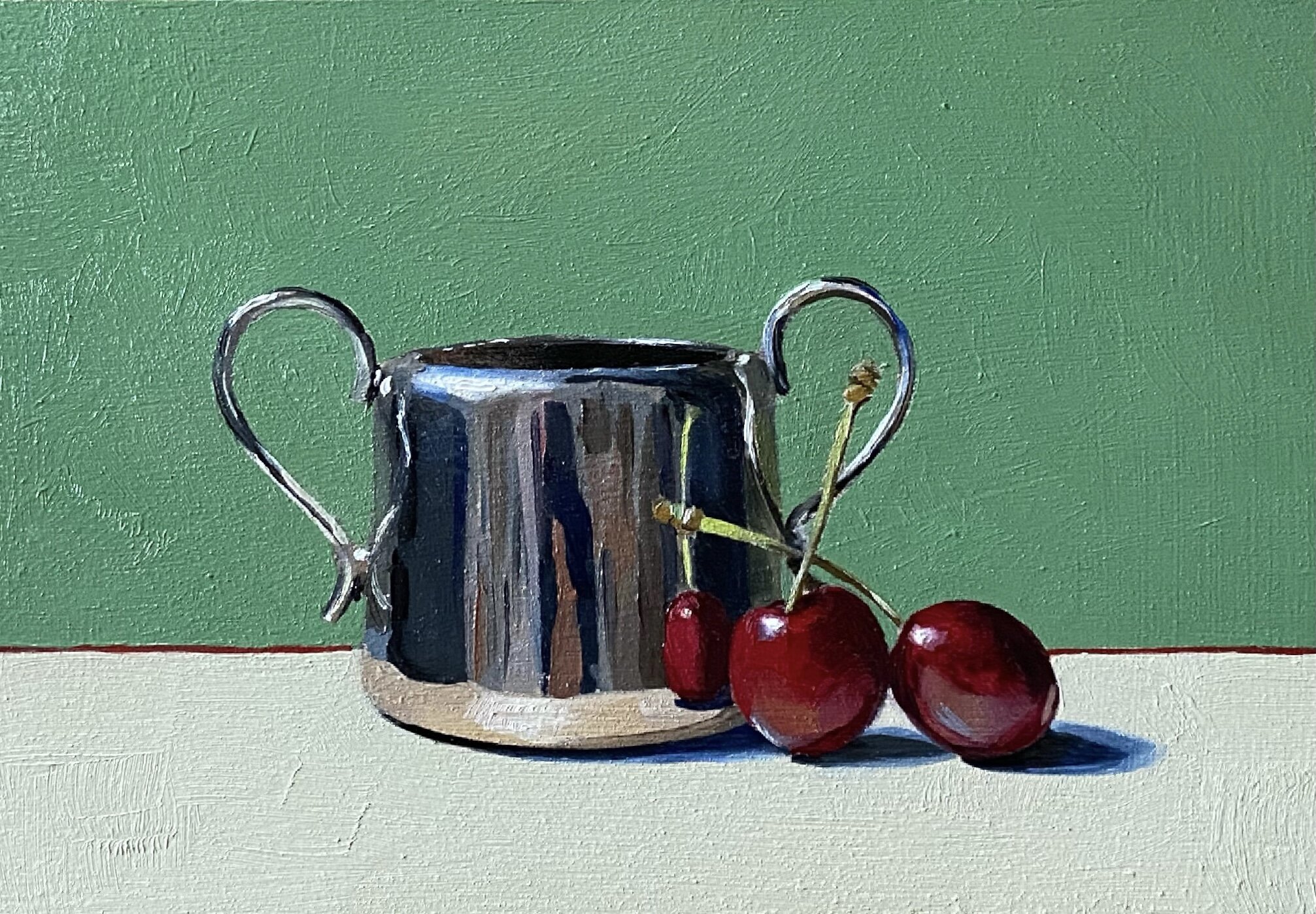 Silver sugar pot with red cherries