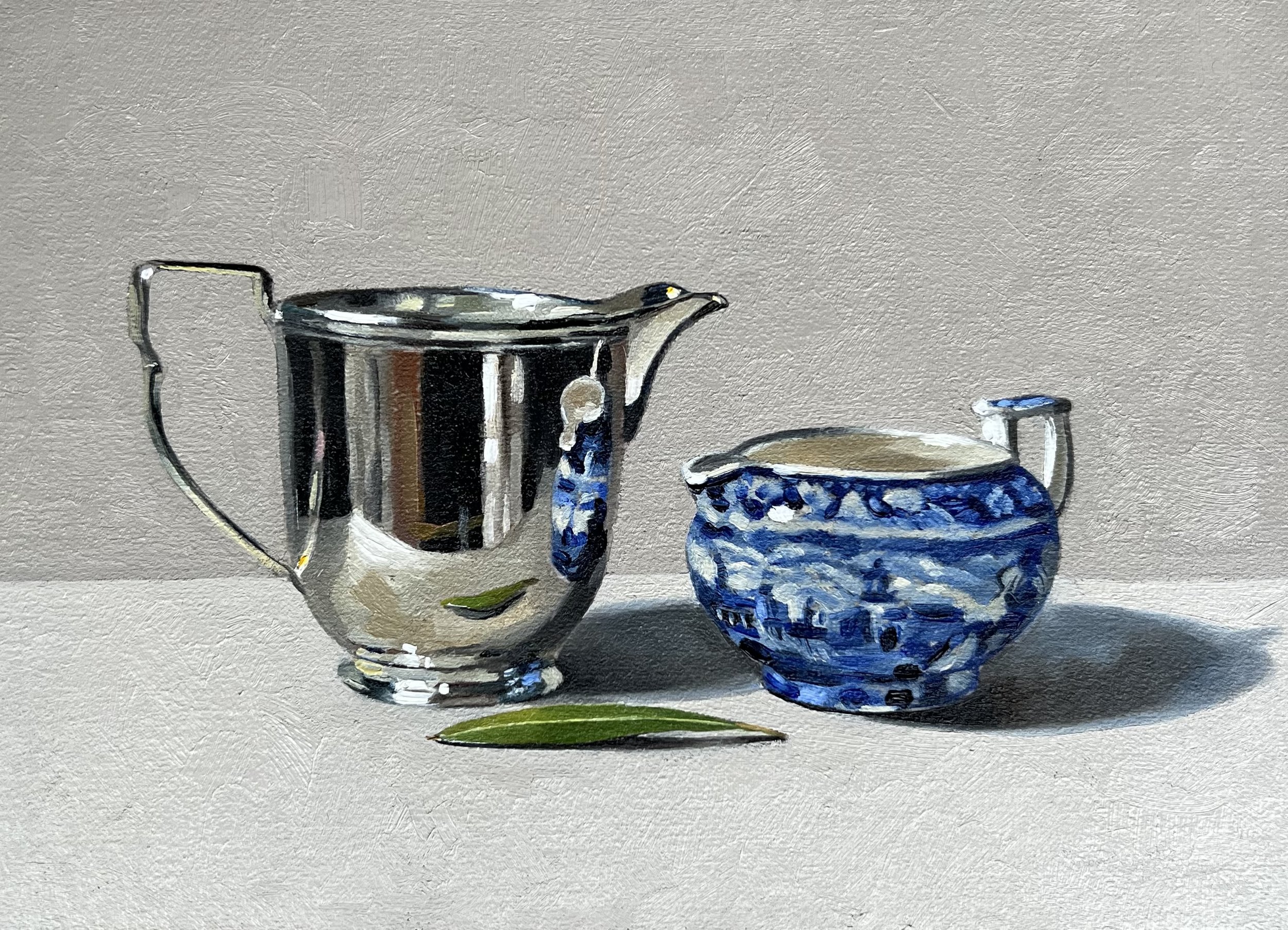 Silver jug, wedgwood jug and olive leaf