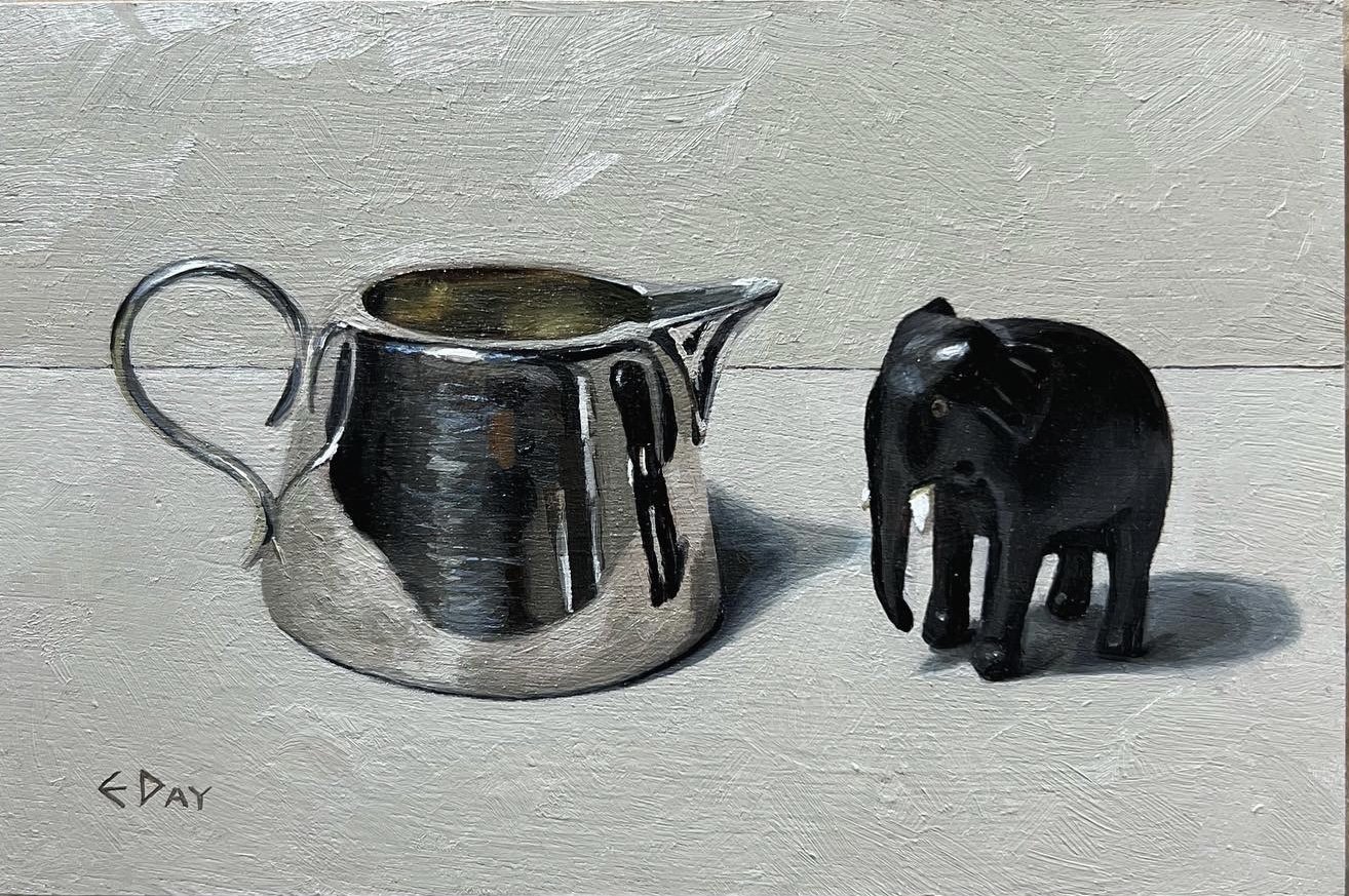 Ebony elephant with silver jug
