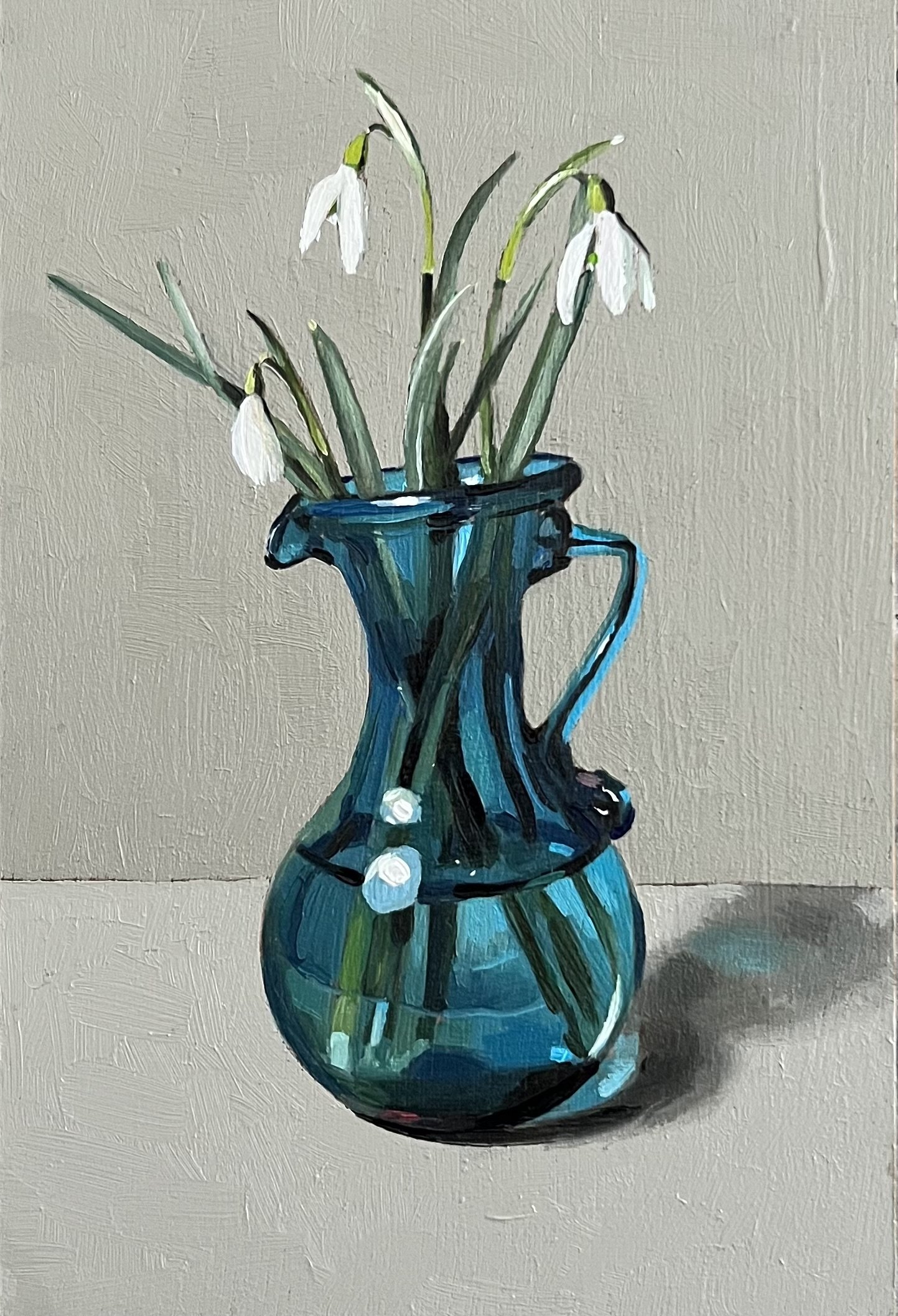 Snowdrops in blue vase