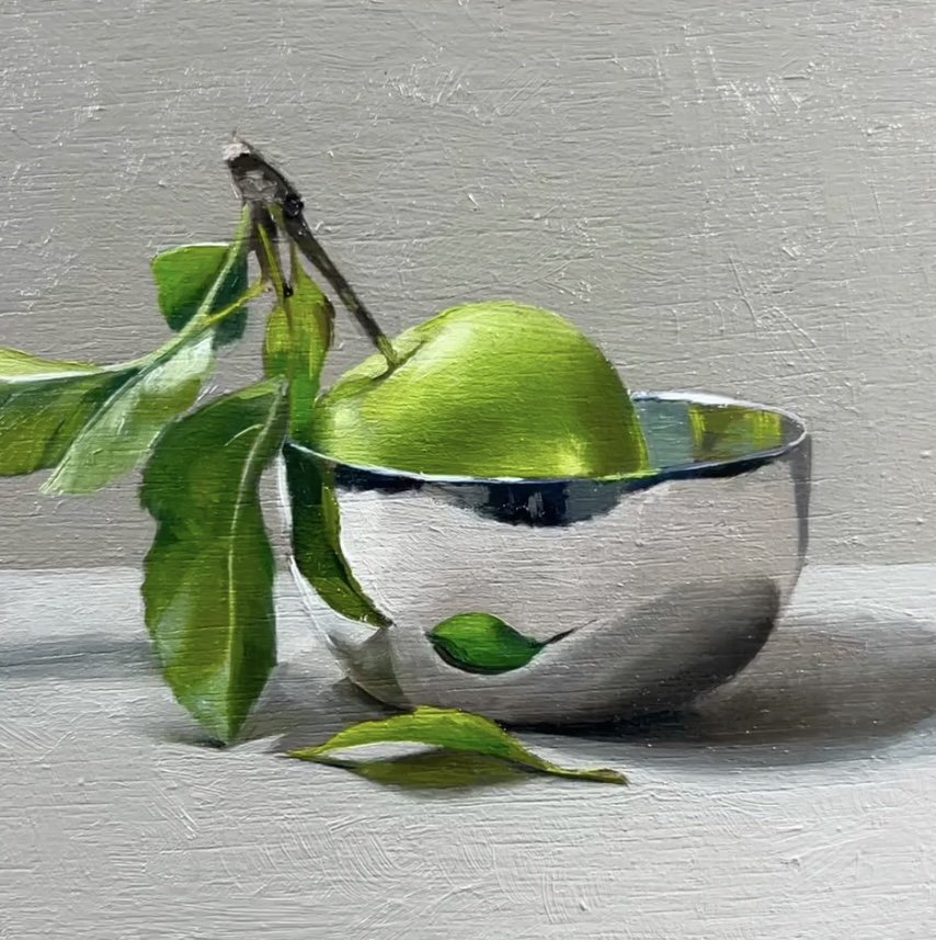 Garden apple in silver bowl
