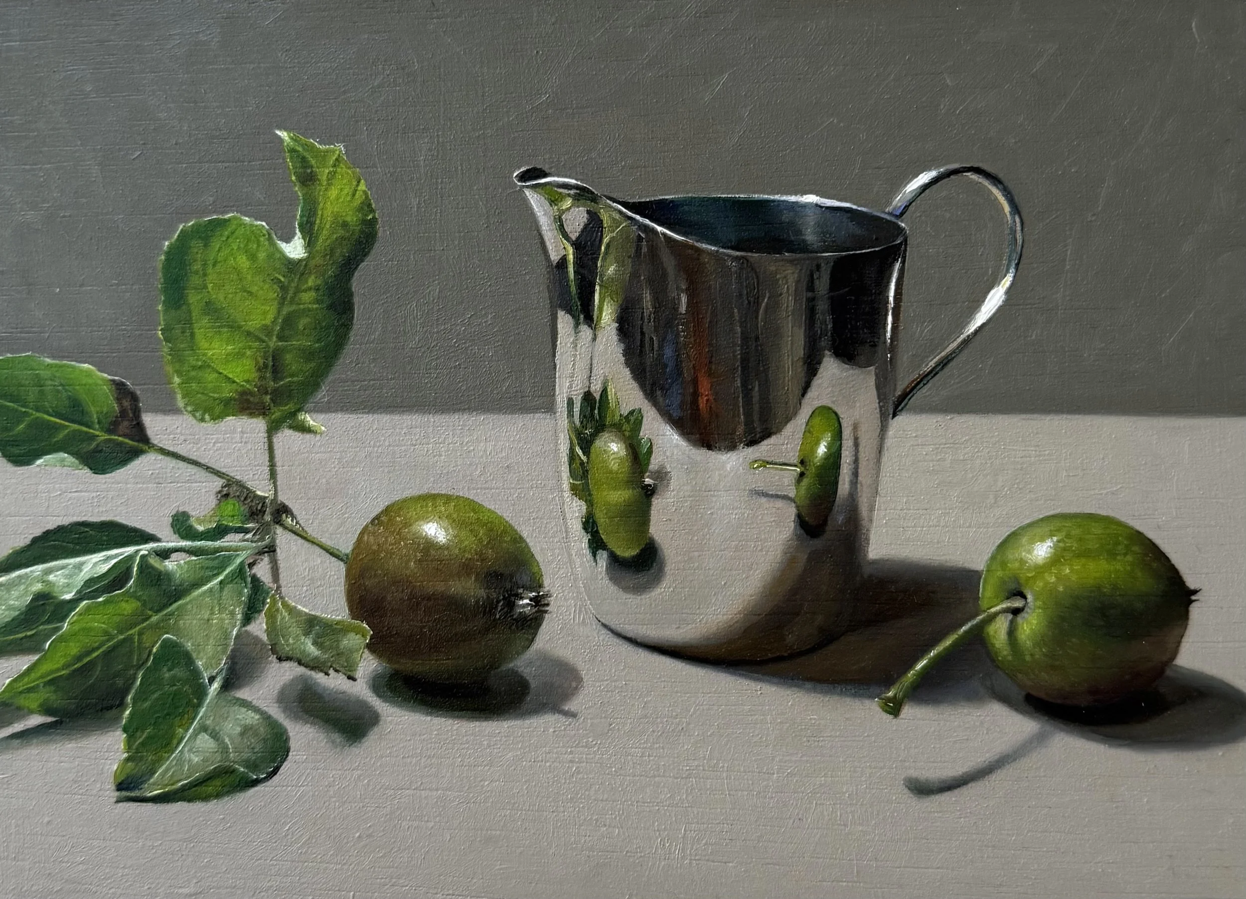 Baby apples with silver jug