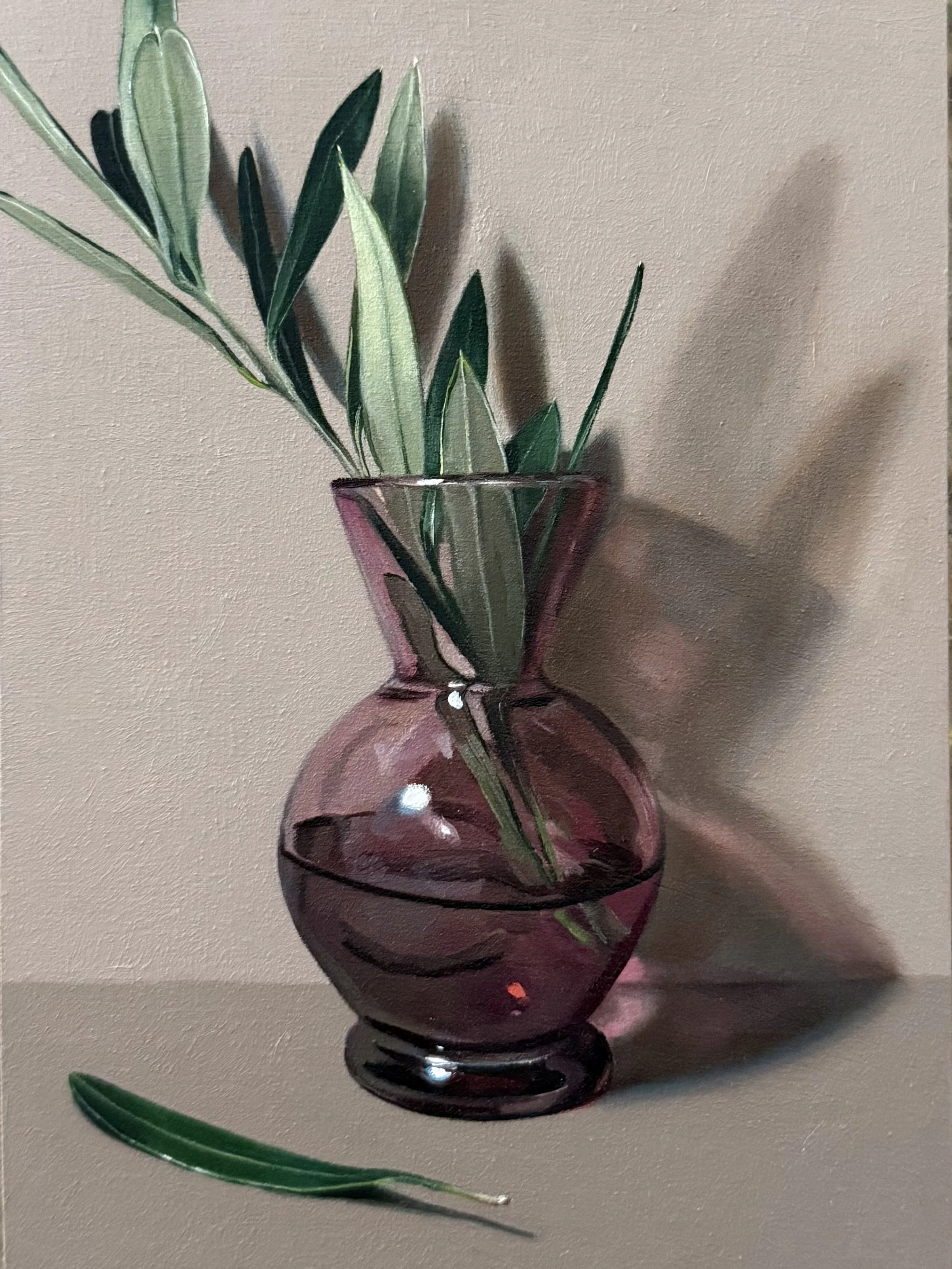 Vintage vase with olive sprig