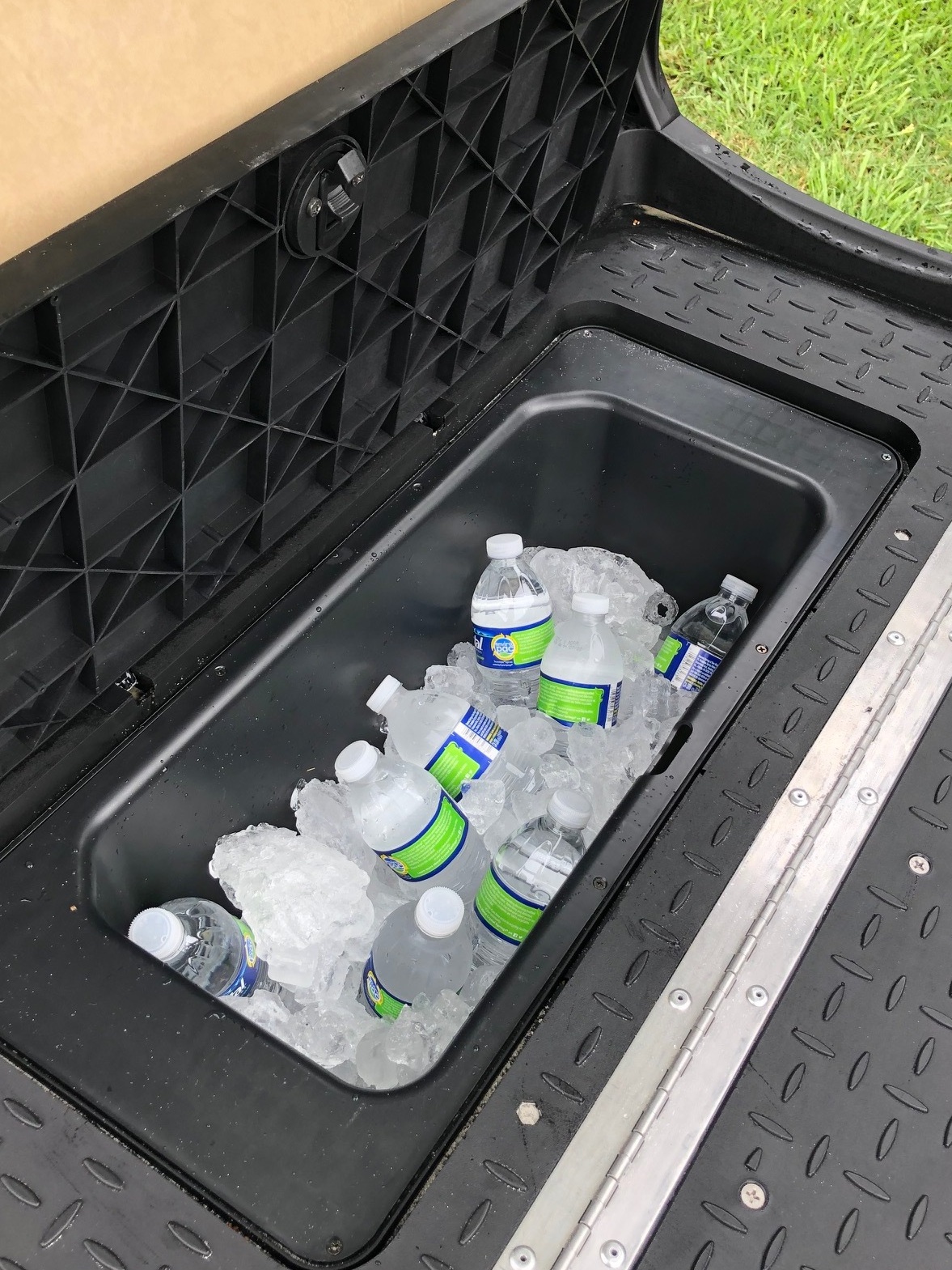 Cooler/ storage bin under rear seat