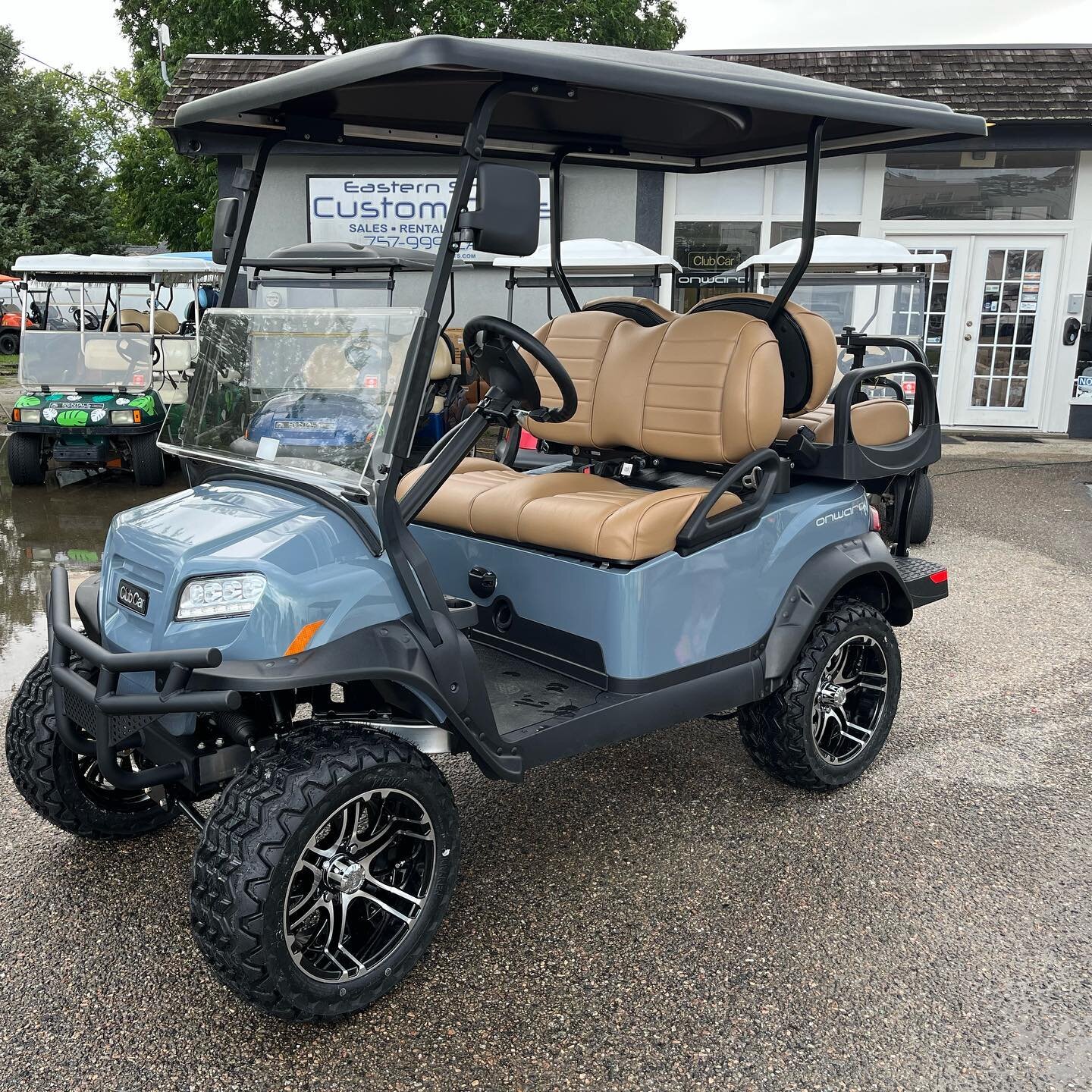 A family was able to pick up their new pearl mist grey @clubcar Onward between rain storms!