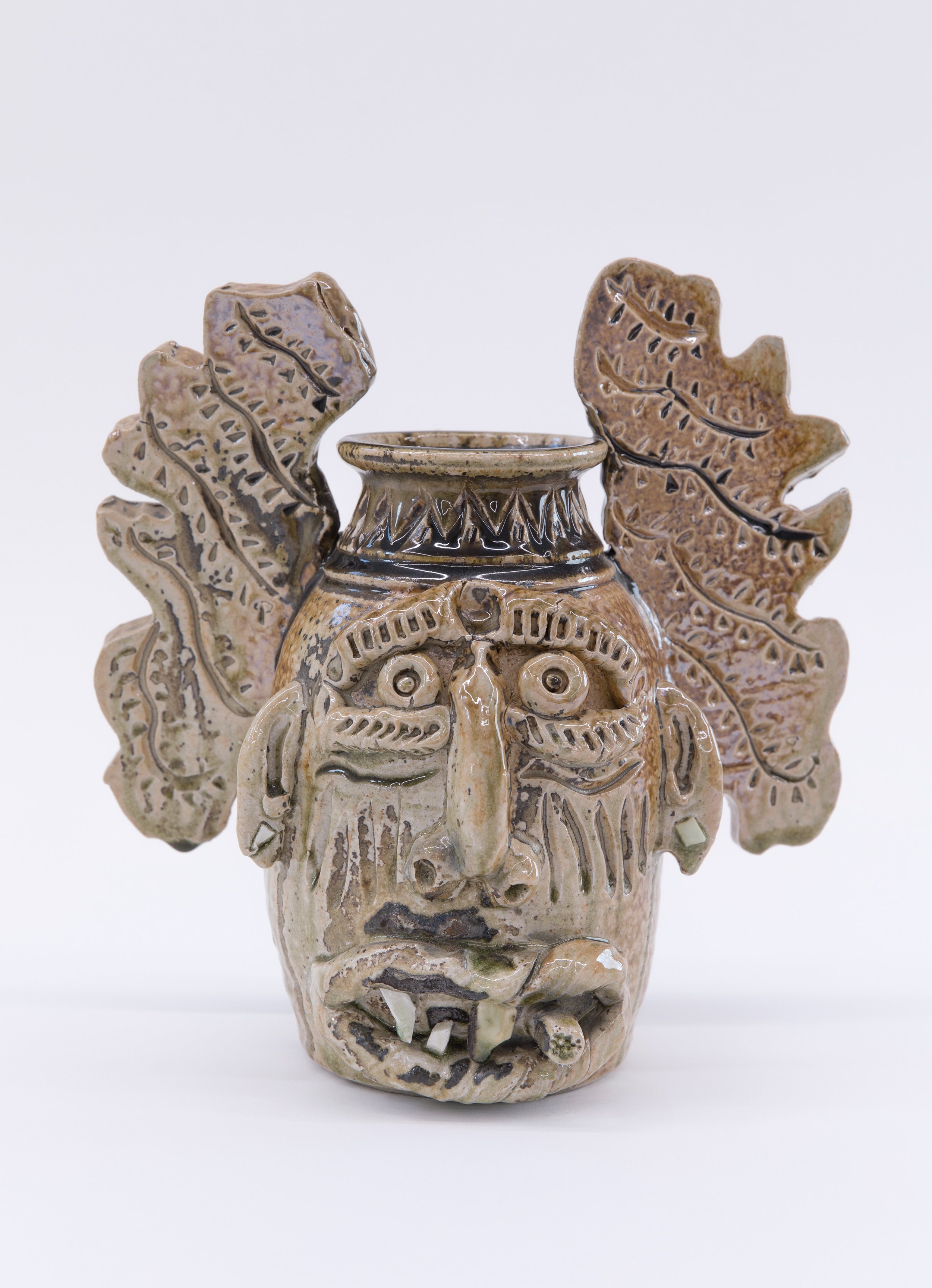 JIM MCDOWELL Angel Watchin’ Over Me , 2021 high fire clay, porcelain, amber celadon glaze, fired in a gas kiln with salt and soda 11.25 x 10.75 inches INQUIRE+