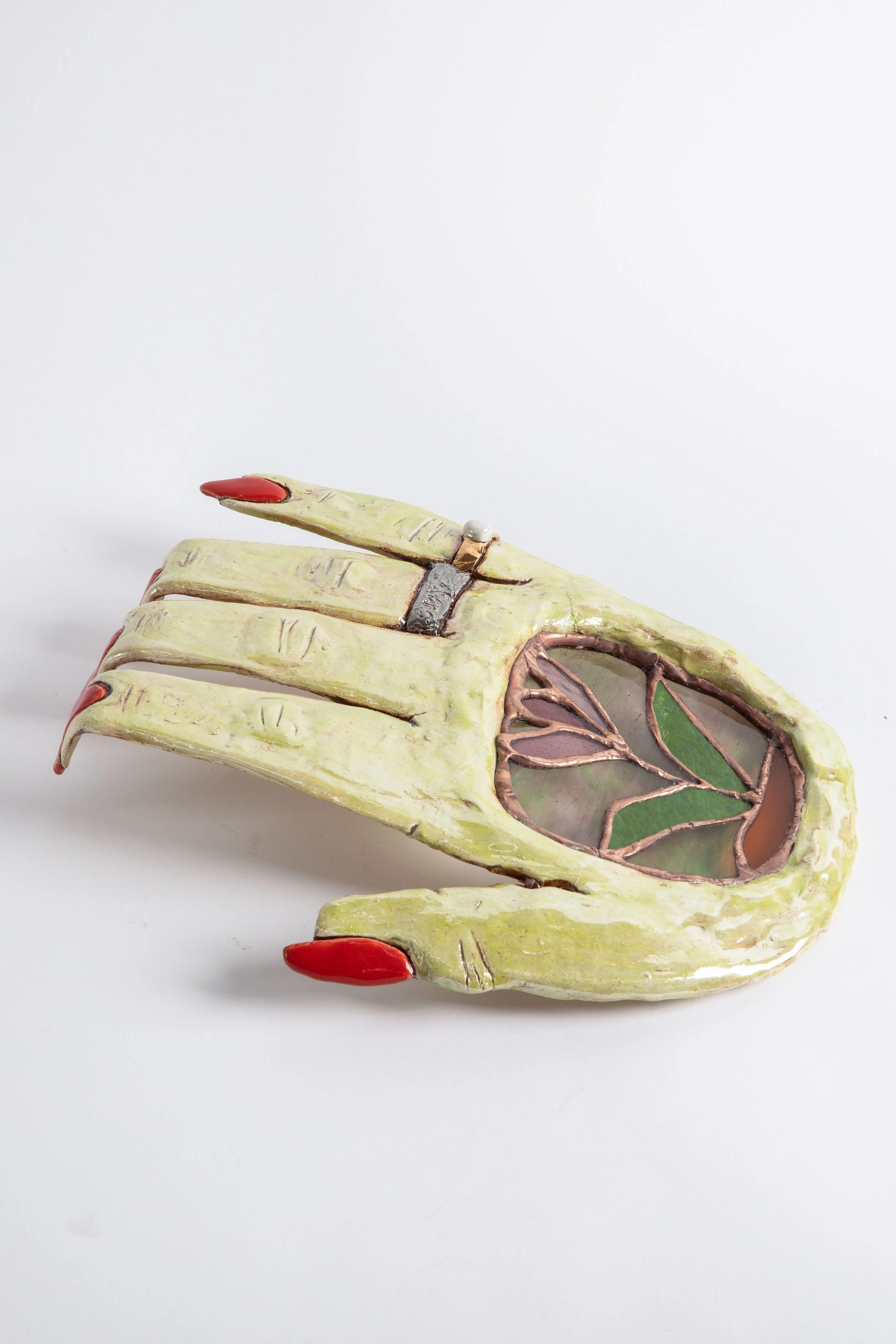  GRACE STOTT  Grandma Hand , 2025 stoneware, glass, solder, gold 12 x 10 x 2.5 inches   INQUIRE+  