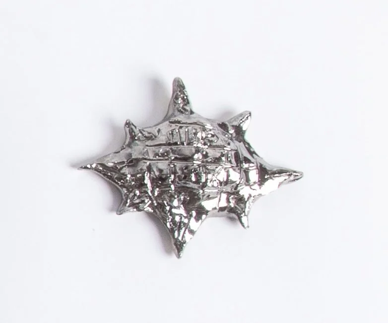  GRACE STOTT  Sparkle star spikey , 2025 stoneware 4.5 x 3.5 x 1 inches   INQUIRE+  