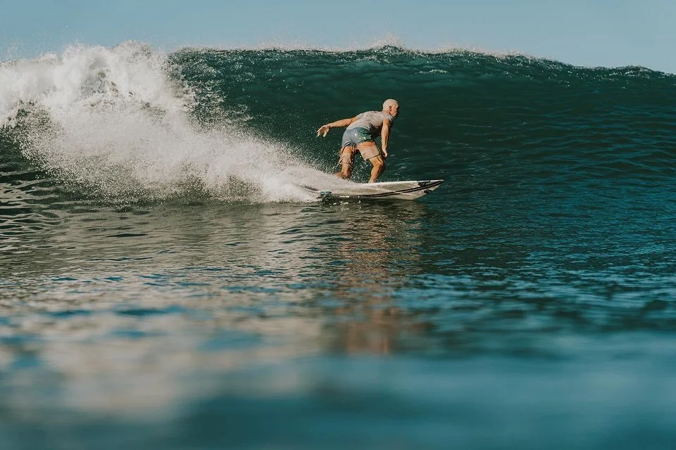 Surfed a lot.  Shot a little.  Played cards till my eyes bled.  Big belly laughs.  The dog jaw acted up.  Lots of Guac.  Some Micheladas.  Mas margs.  Beach cleanups.  Kelly sighting.  Madison snuggles.  Party shirt surf Friday.  Perfected sunshine r
