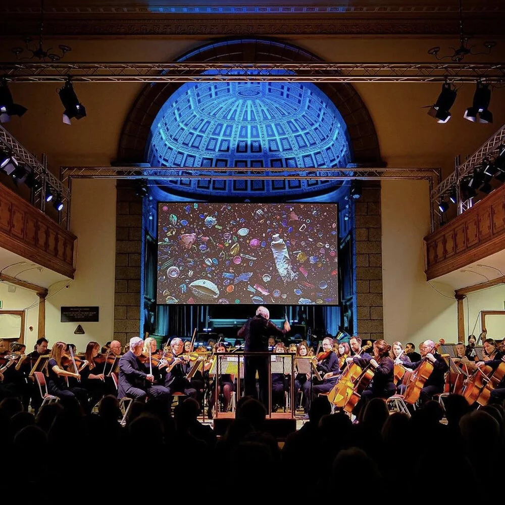Guernsey Philharmonic Orchestra, playing “Une barque sir l’ocean” to my images at the Guernsey Photographic Festival 16 November 2019.