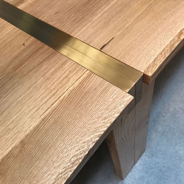 Pair of custom white oak office tables with brass detailing. On their way to @wework Vancouver Monday. Did you know we do full custom? Fabrication by @agostinisdesigns
