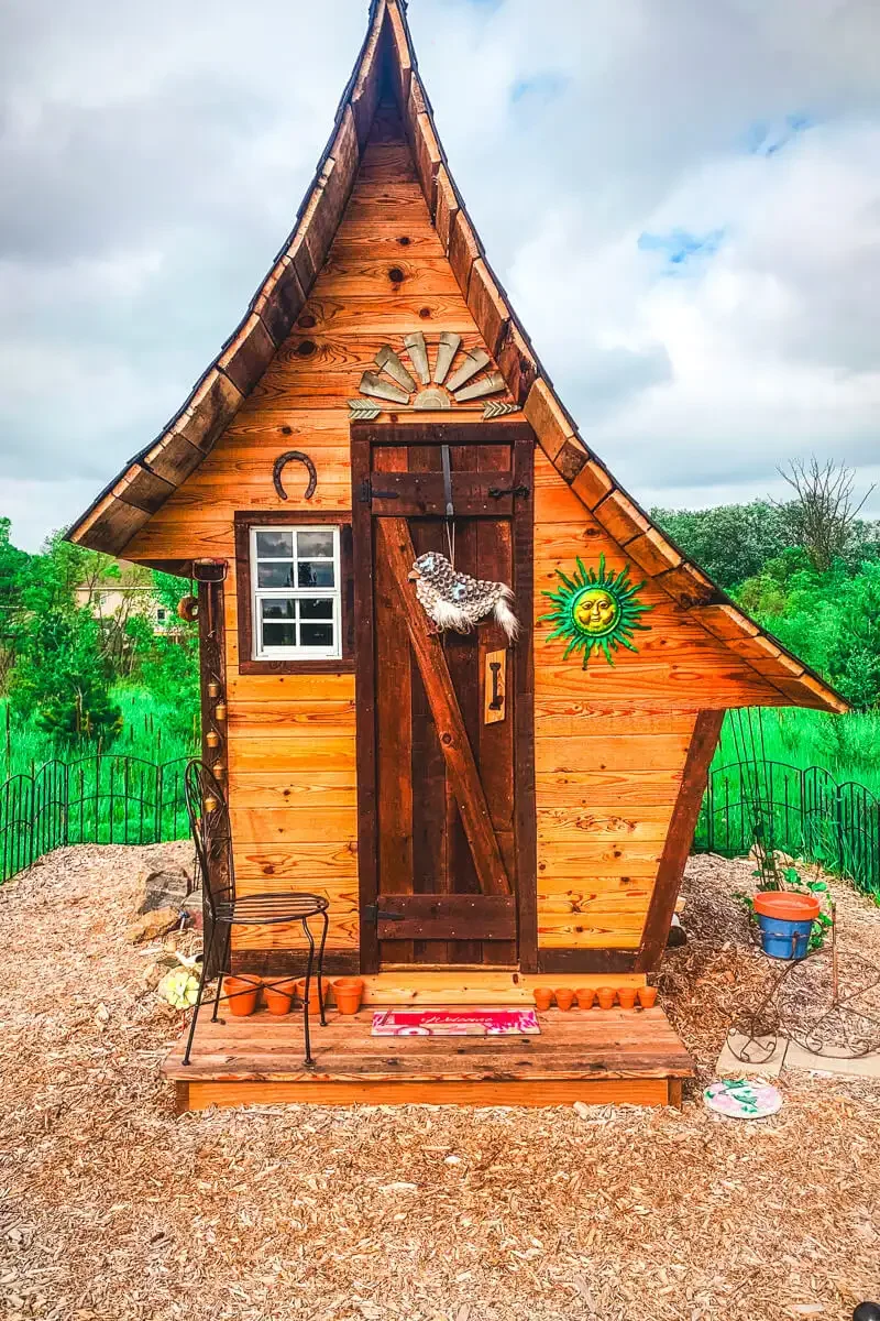 crooked-shed-with-curved-roof.webp