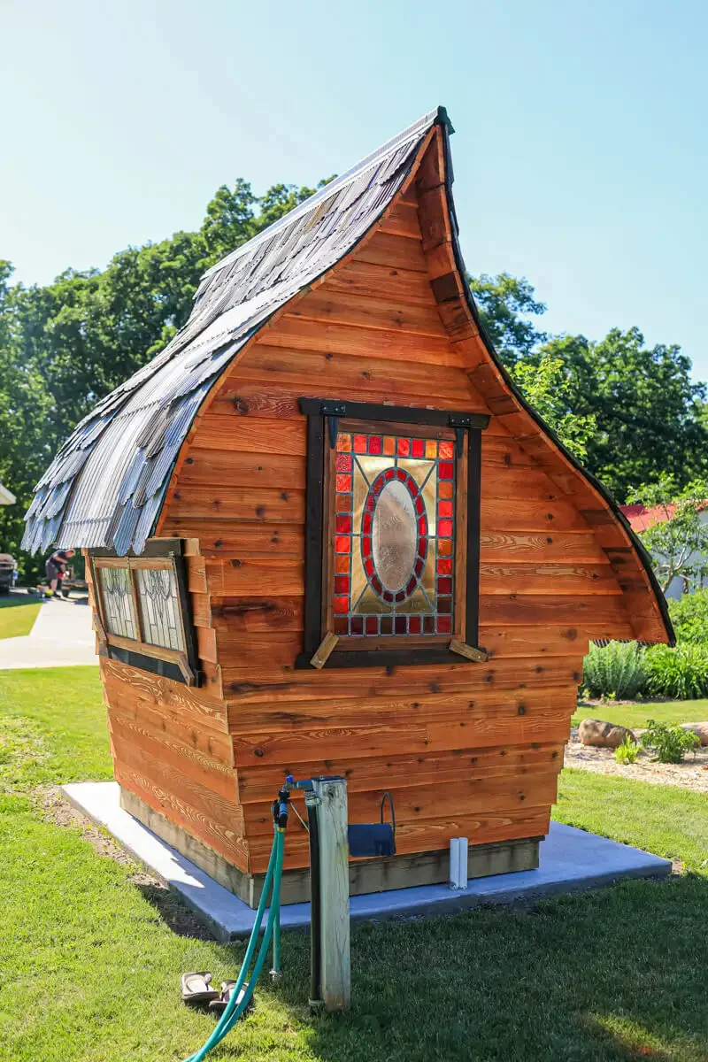 whimsical-garden-shed-stained-glass.webp