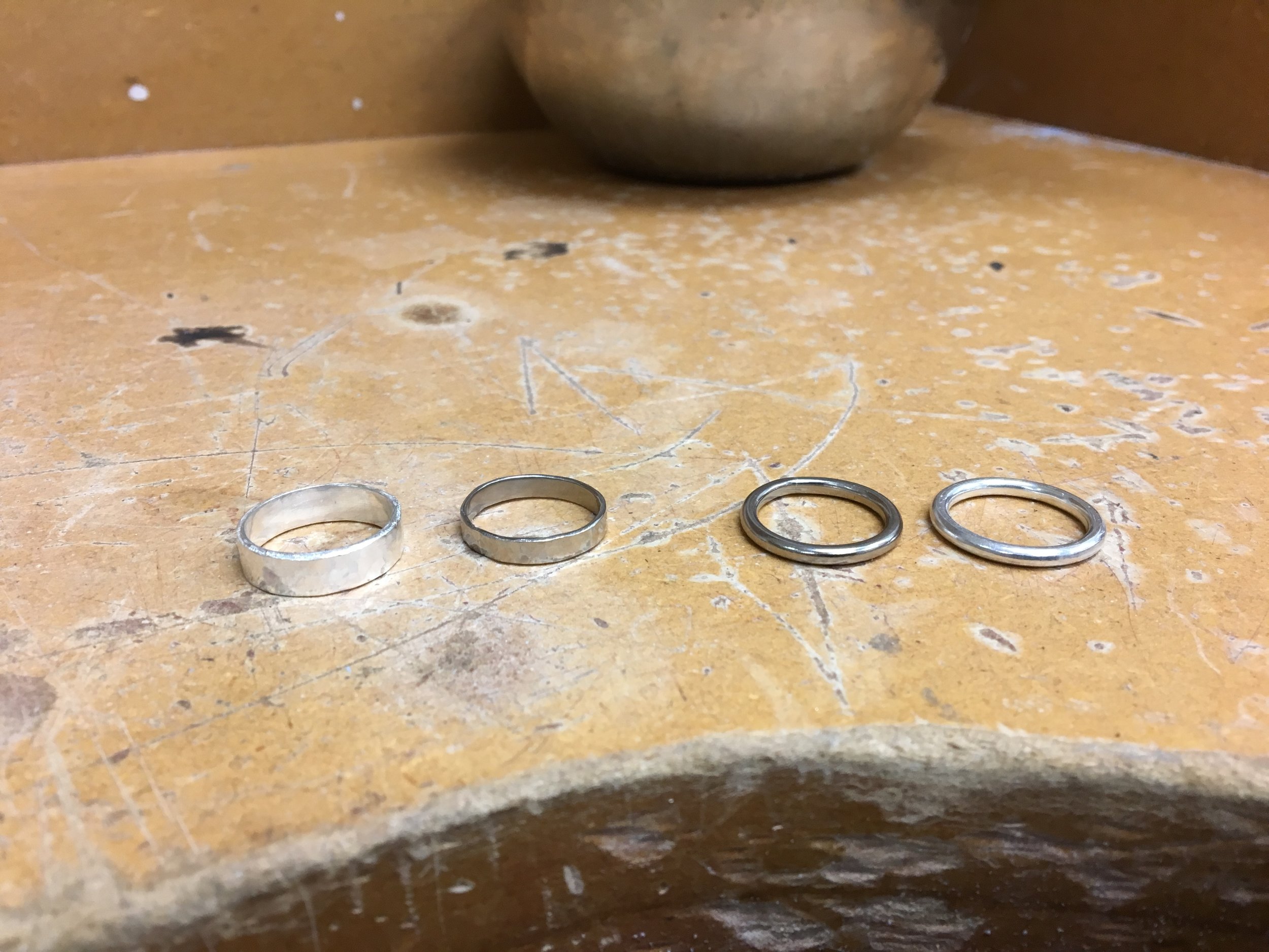 Hand made wedding rings, created by the happy couple for each other. Made initially in sterling silver for practice and then white gold for the final pieces.